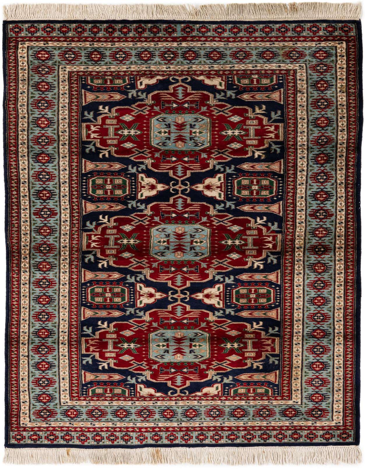 A 4x6 rectangular traditional Oriental rug featuring a rich red and navy blue central medallion design with intricate patterns and a light blue border, made of hand-spun wool.