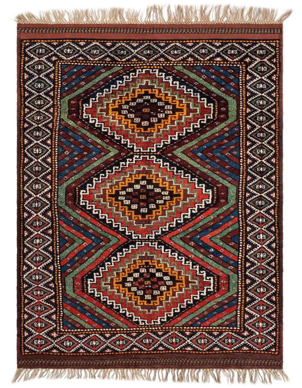 A rectangular 5x8 Persian rug with a rich red base, featuring intricate geometric patterns in blues, greens, golds, and creams, with fringed ends.