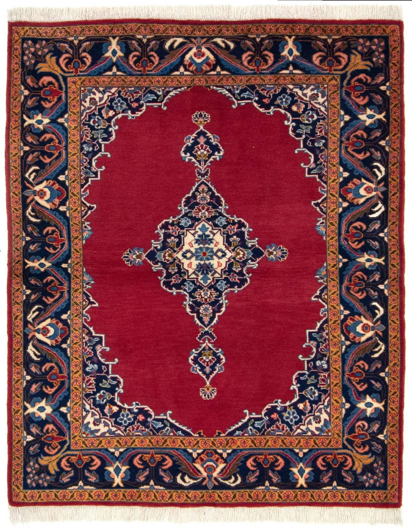 A 3x5 rectangular Kerman Persian rug with a deep red field and intricate navy, gold, and blue floral borders.