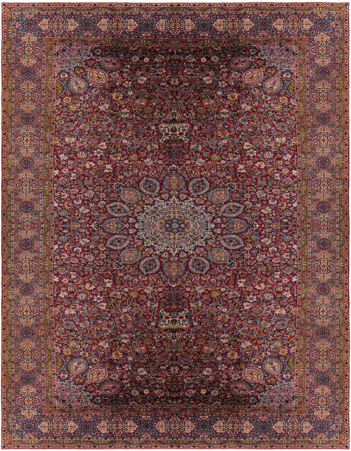 A large rectangular Kerman Palace rug in deep red, featuring an intricate traditional floral medallion and border.