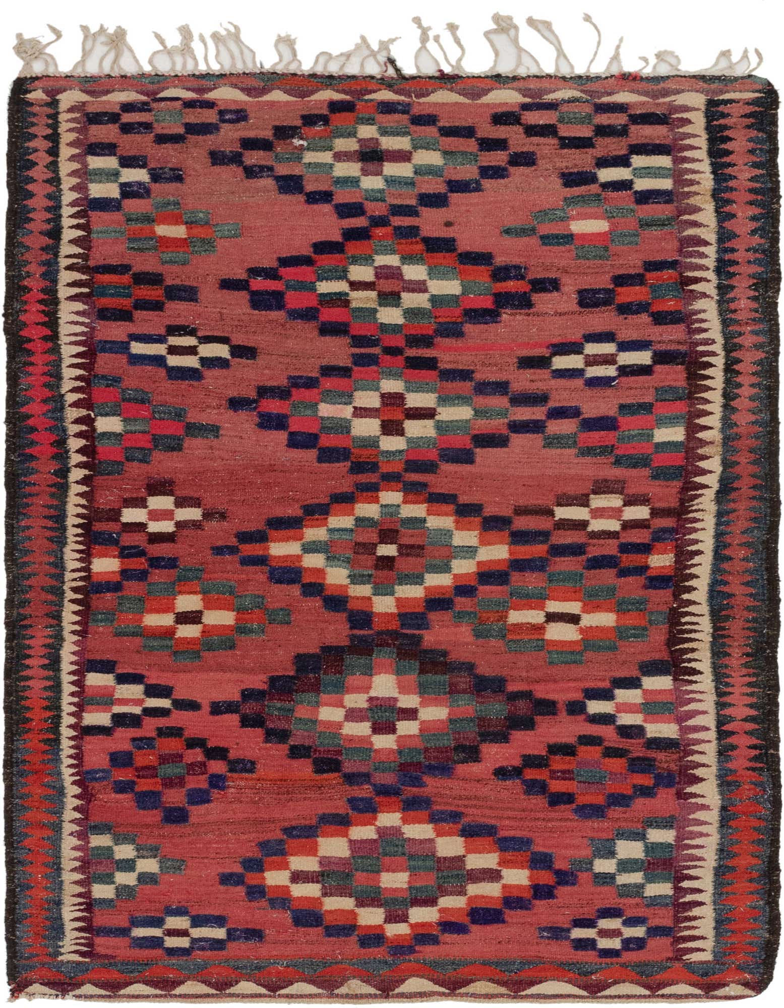A 5x8 rectangular Kilim Fars rug with a red background and colorful geometric patterns, featuring small tassels.