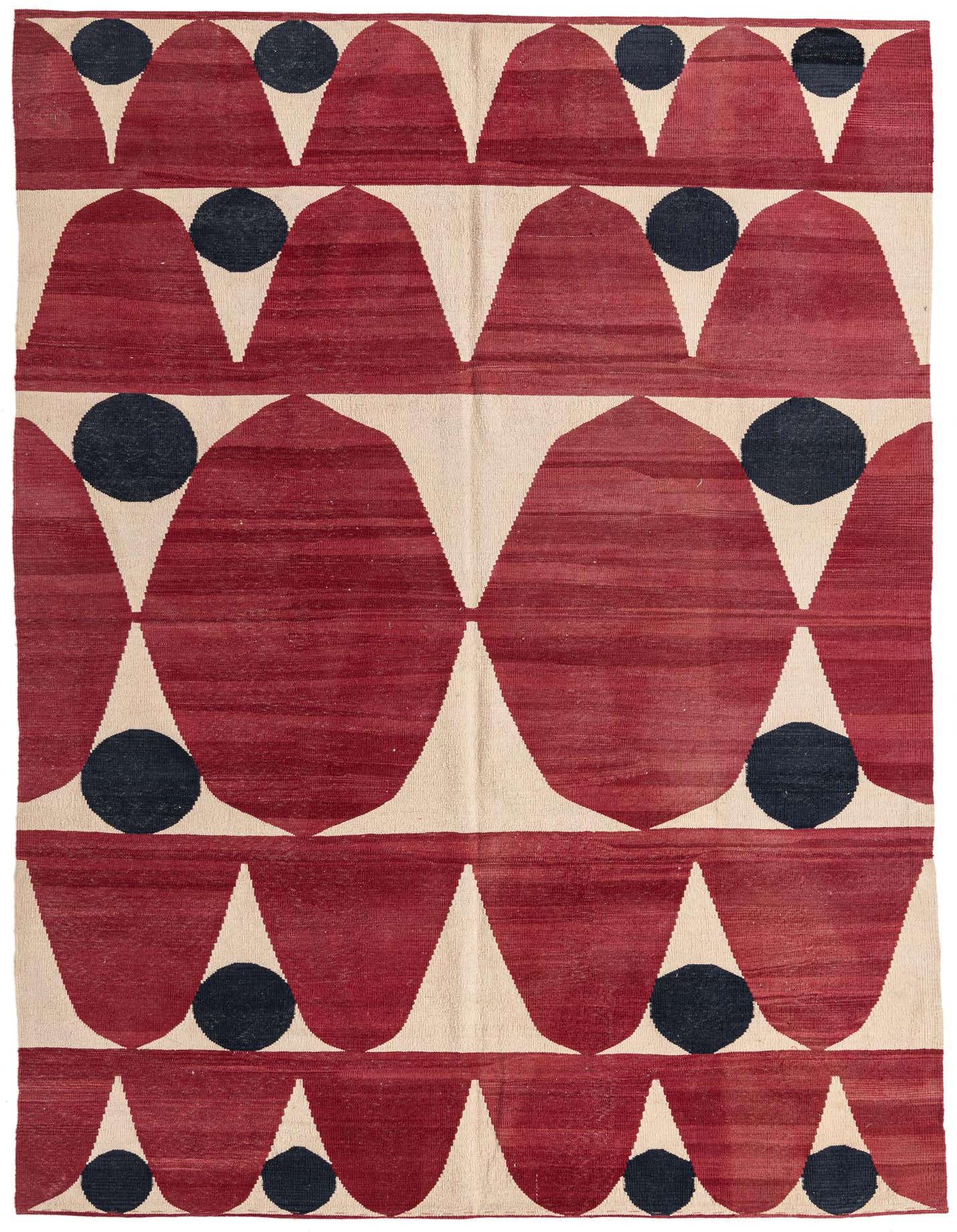 A 7x10 rectangular flatweave rug featuring a bold tribal pattern of red teardrop shapes and black circles on a cream background.