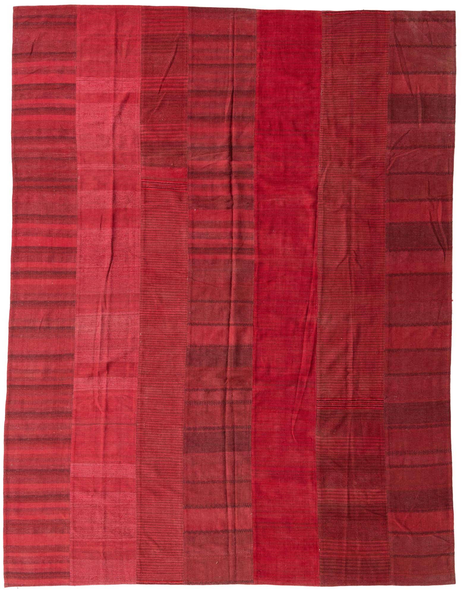 A 10x12 rectangular Kilim Modern rug in varying shades of red, featuring a flatweave tribal pattern.