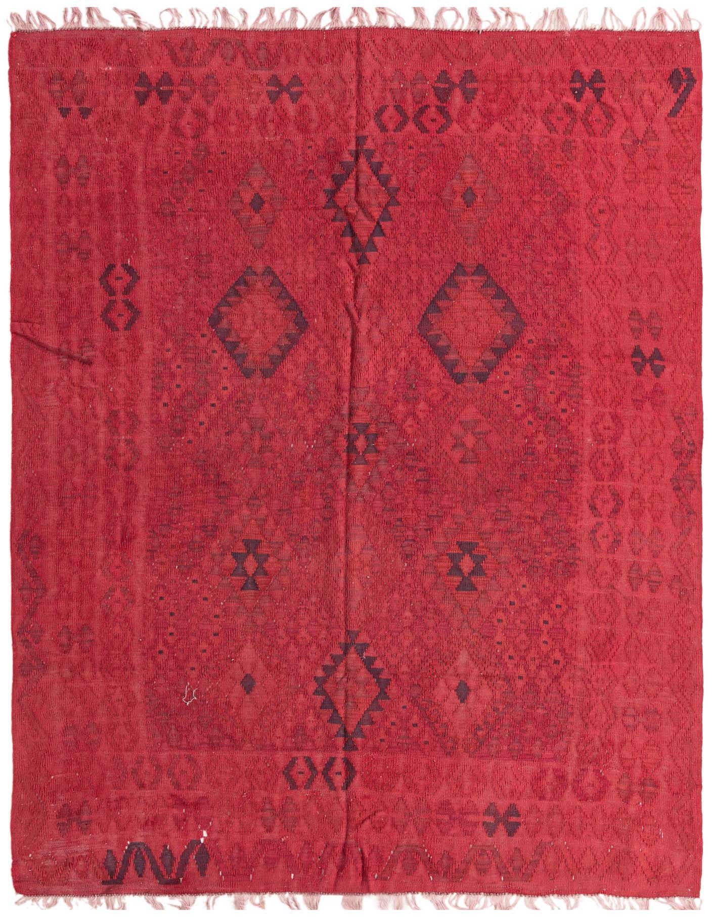 A 5x8 rectangular red wool flatweave rug with dark tribal geometric patterns and fringe edges.
