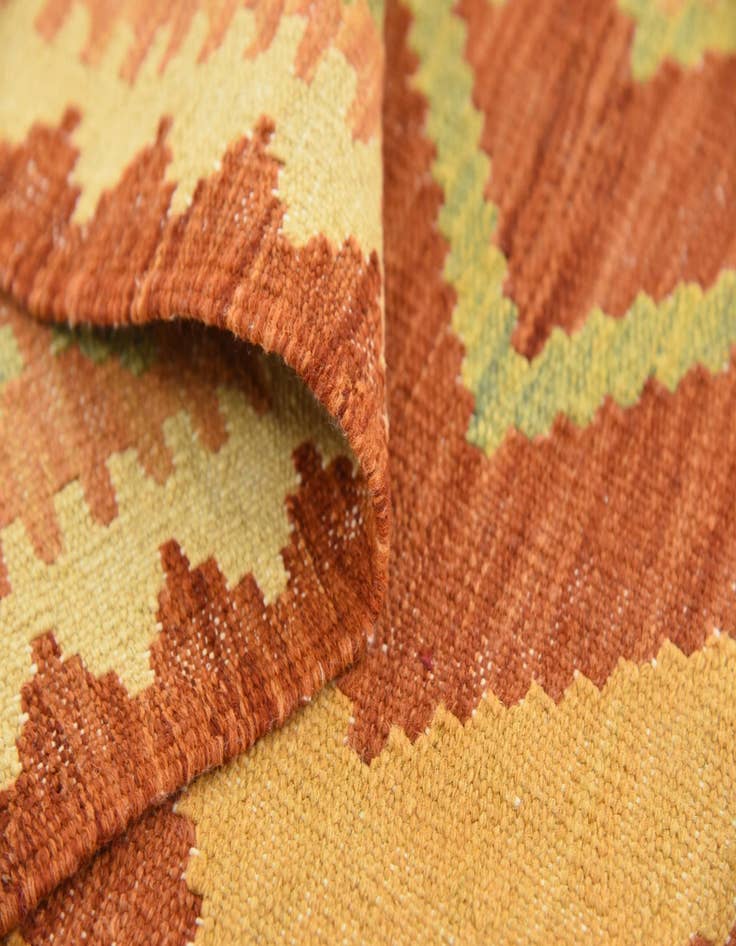 Detail image of  4' 1 x 5' 10  Hand Woven Kilim Waziri Wool Rug
