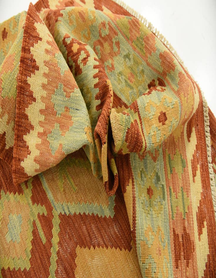 Detail image of  4' 1 x 5' 10  Hand Woven Kilim Waziri Wool Rug