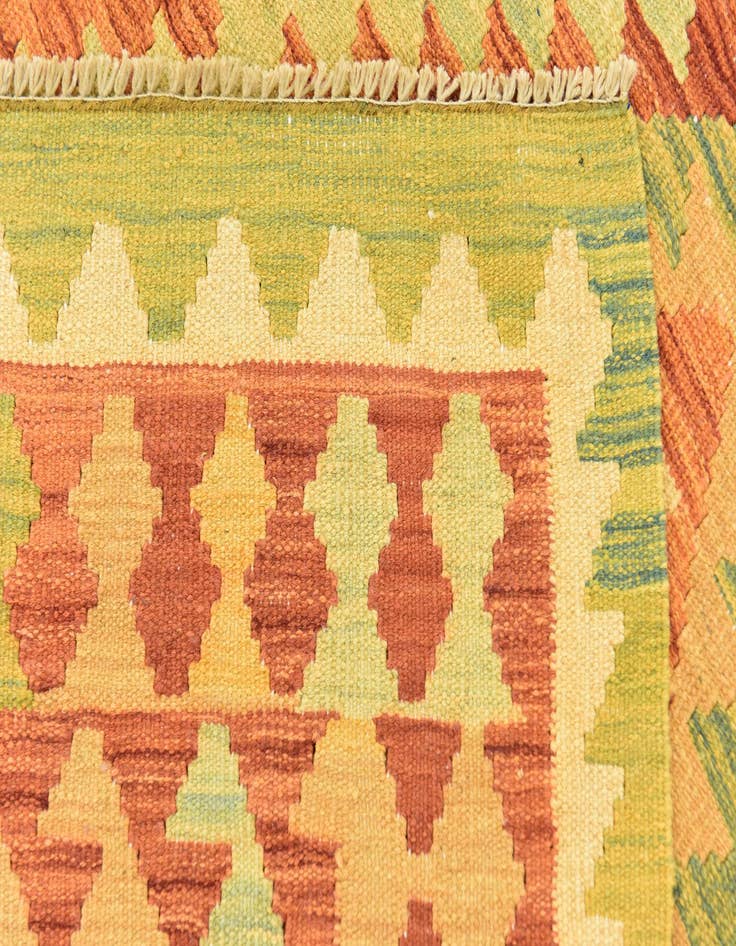 Detail image of  4' 3 x 5' 9  Hand Woven Kilim Waziri Wool Rug