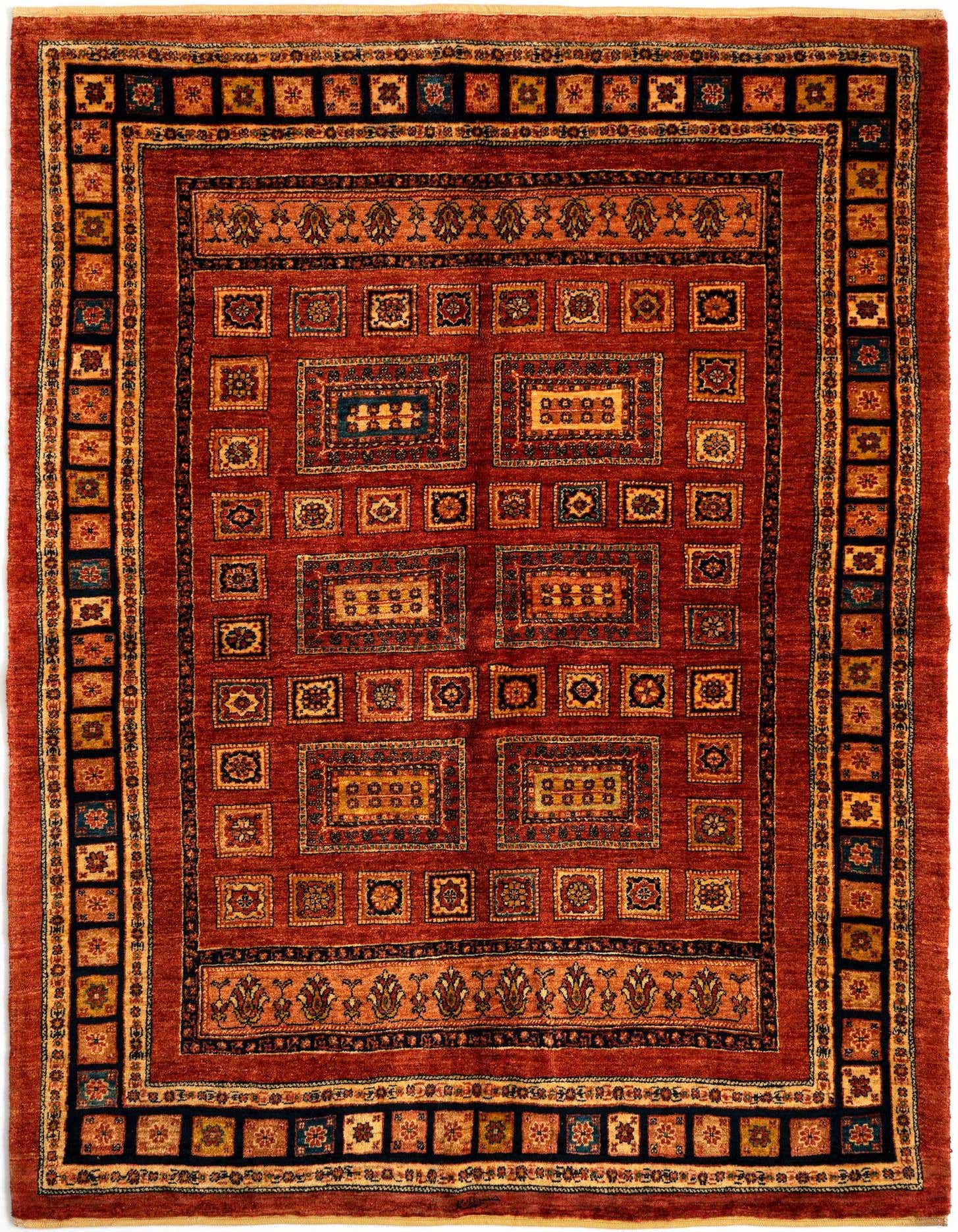 A 5x8 rectangular red Persian wool rug featuring intricate geometric patterns and a detailed border in shades of red, gold, and blue.