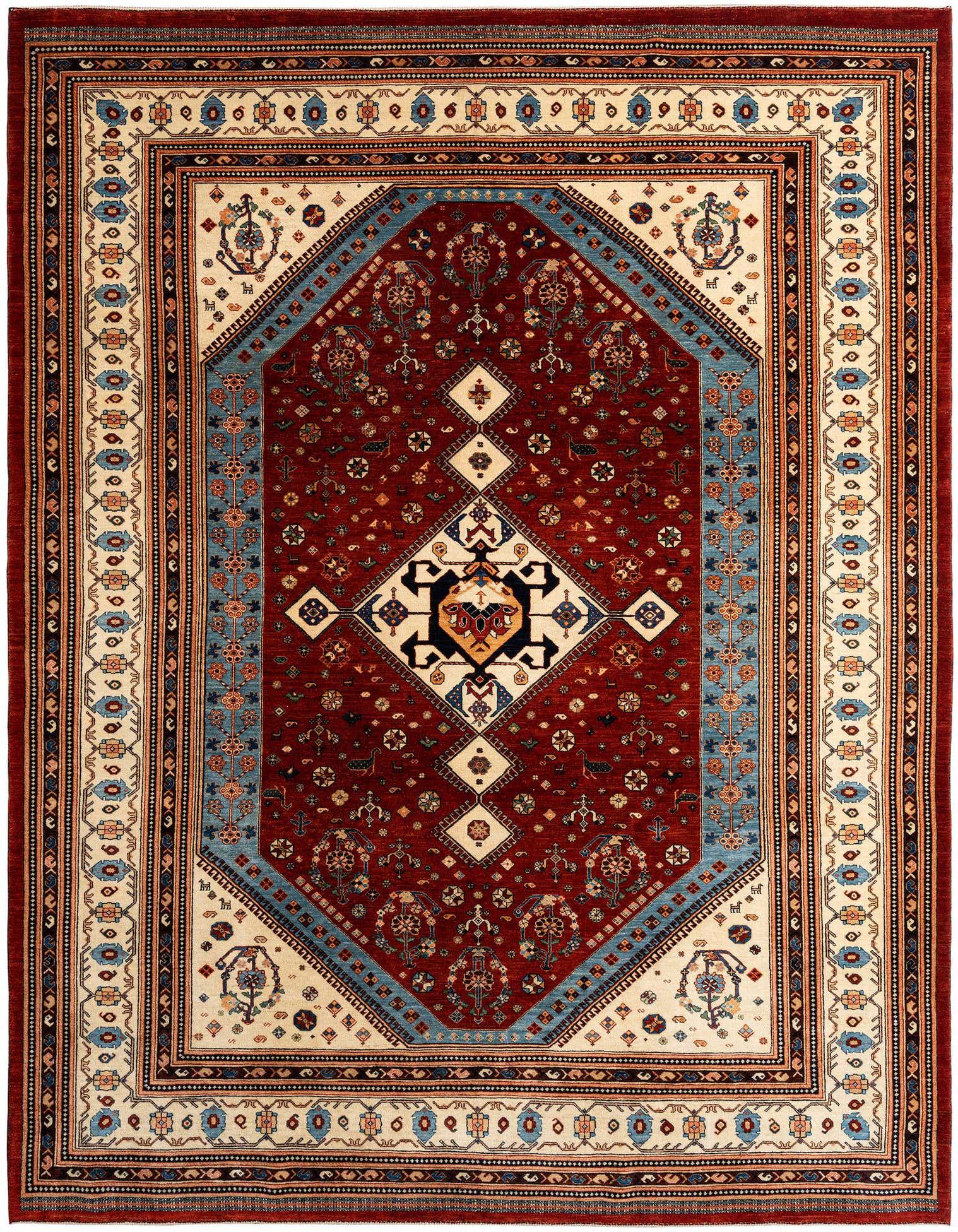 A handmade rectangular Persian rug featuring a rich red field with intricate floral motifs and a central diamond medallion, framed by a cream and blue border.