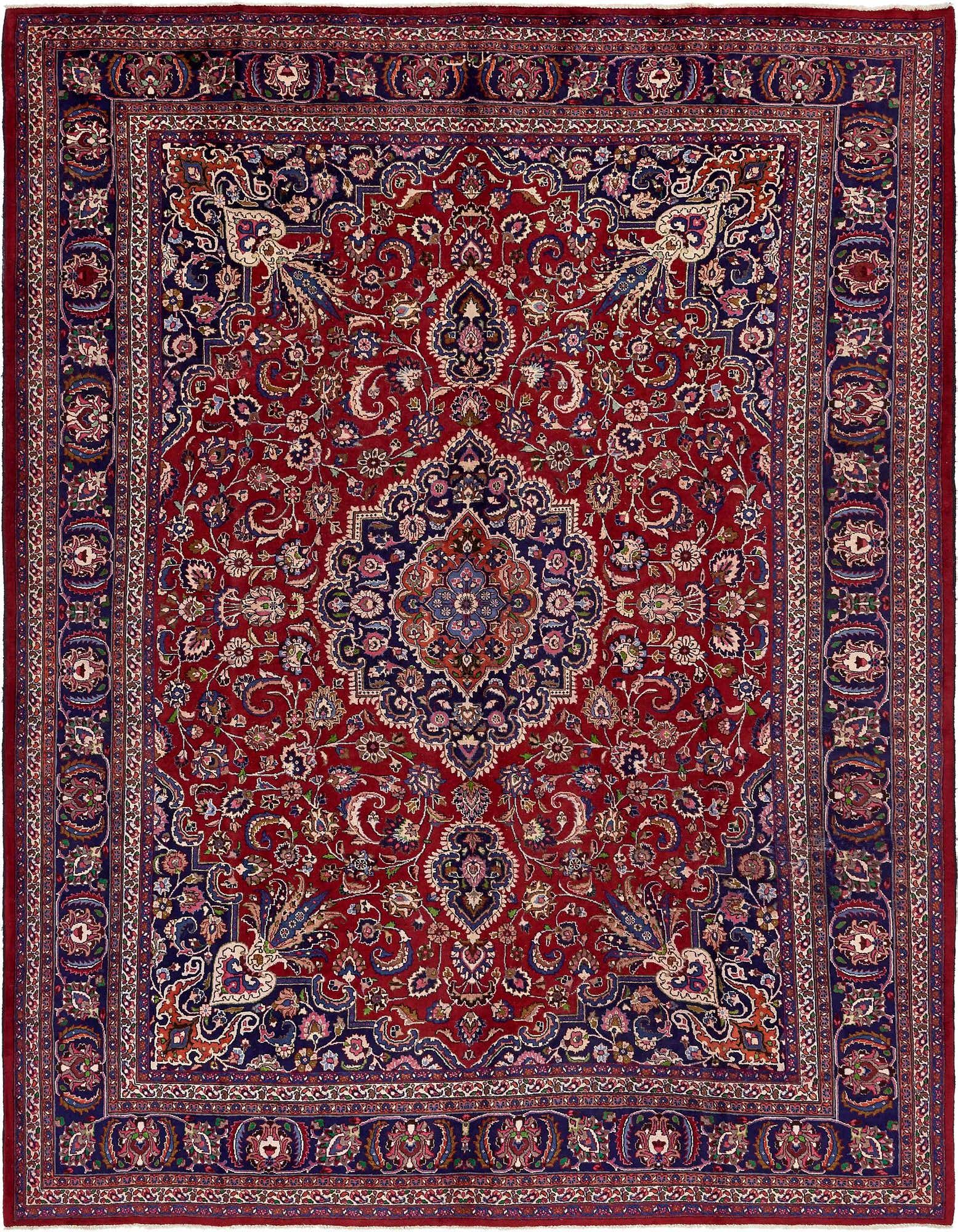 A large 10x13 rectangular red Persian wool rug with a central medallion and intricate botanical patterns.