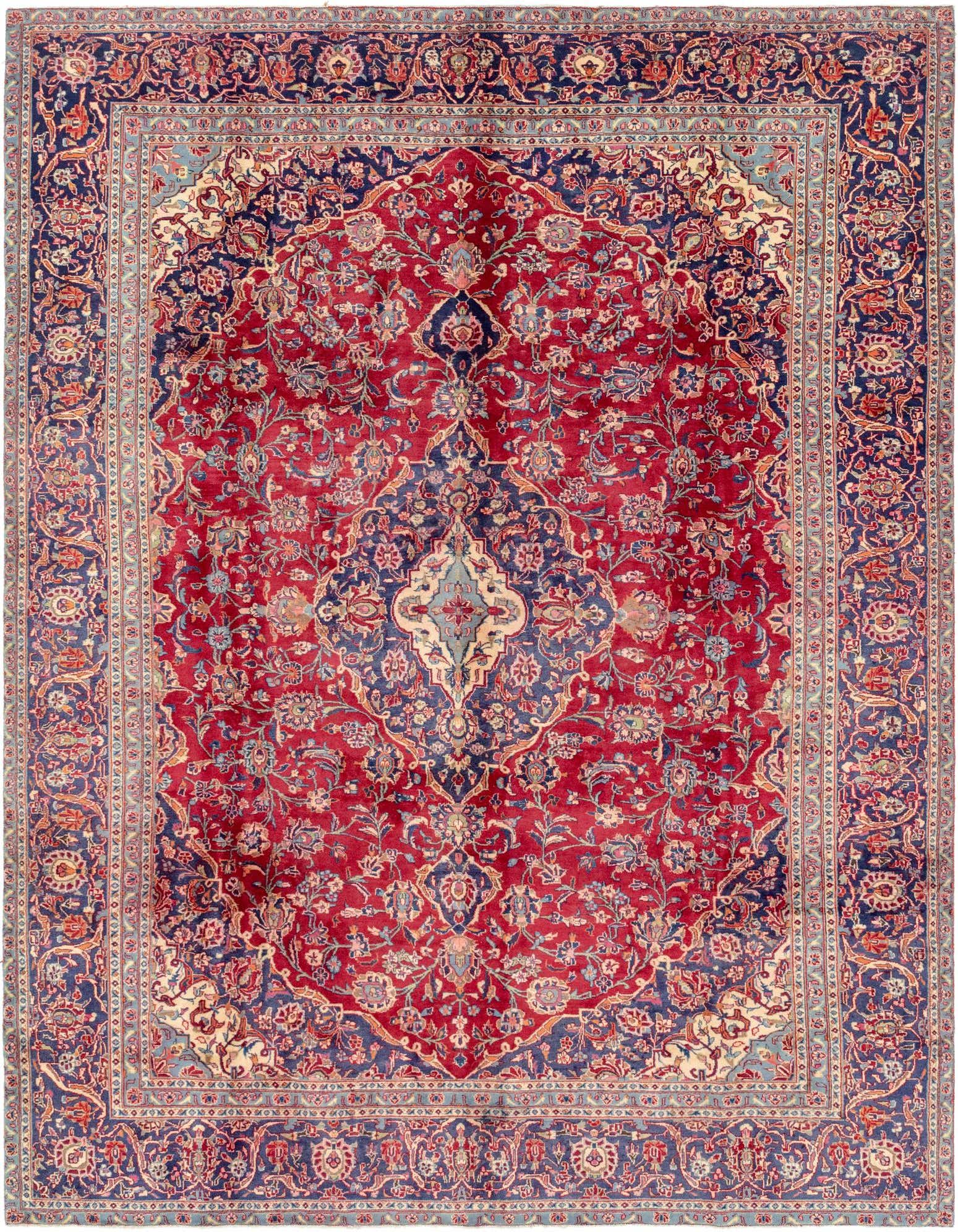 A 10x13 rectangular red wool rug with a traditional Persian botanical medallion pattern and navy blue border.