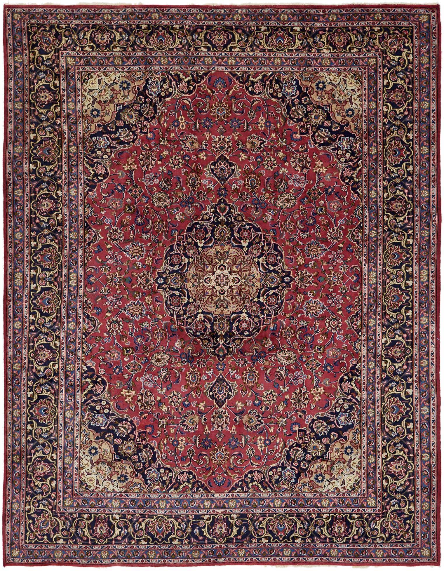 A 10x13 rectangular red wool Persian rug with a central medallion and intricate botanical patterns.