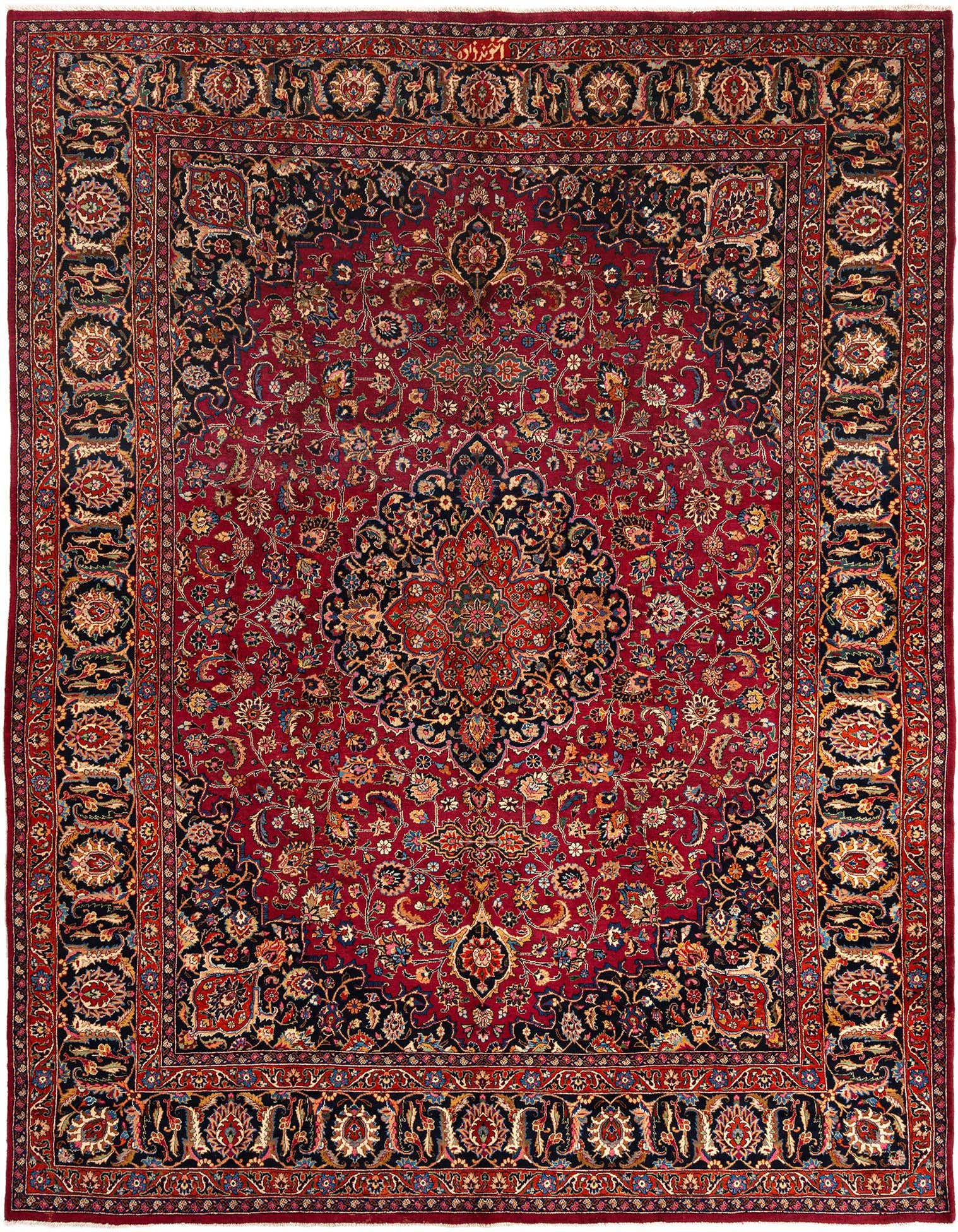 A large 10x13 rectangular red Persian wool rug with intricate floral patterns and a central medallion.