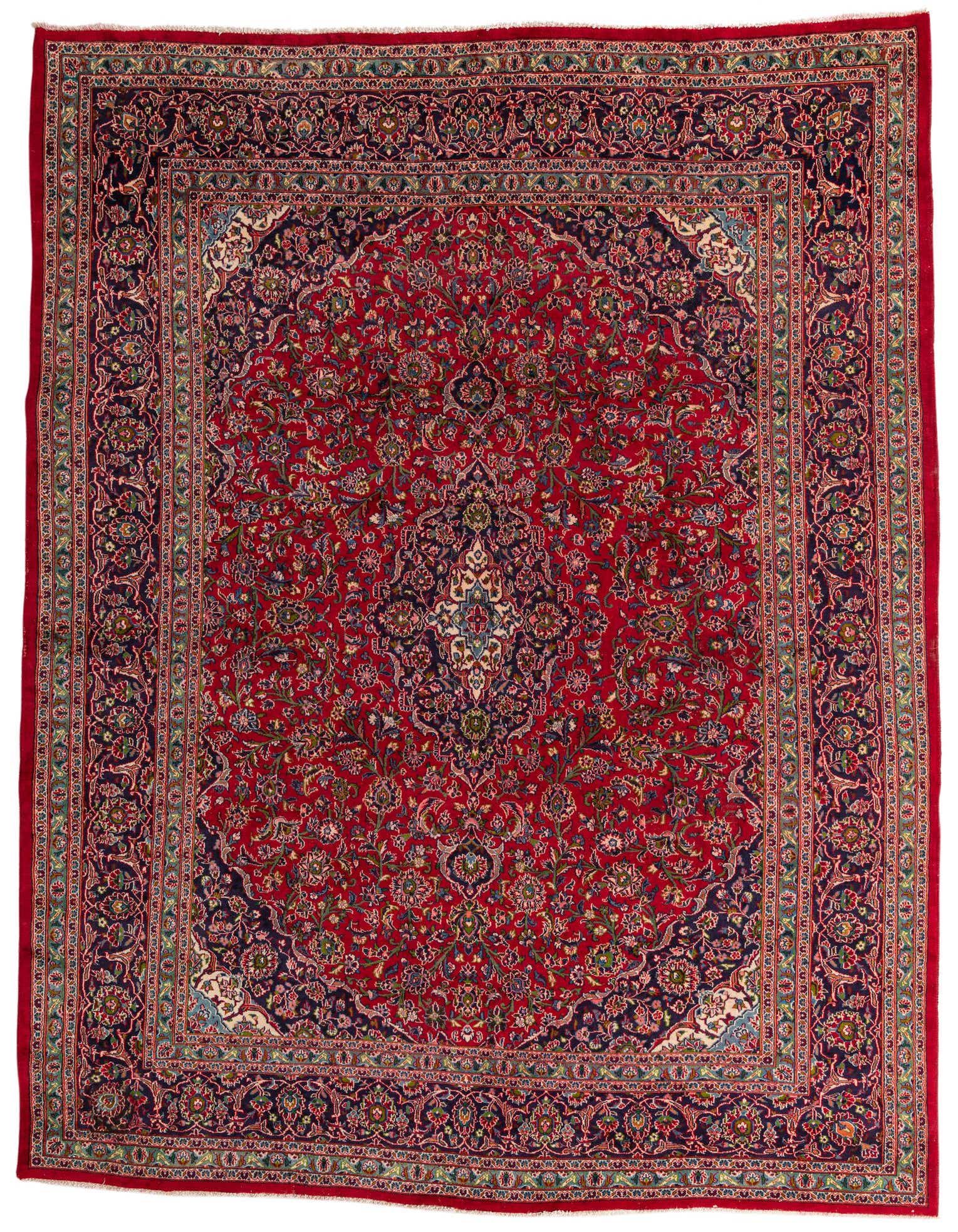 A 10x13 rectangular red Persian Mashad rug with an intricate floral medallion pattern and dark blue border.