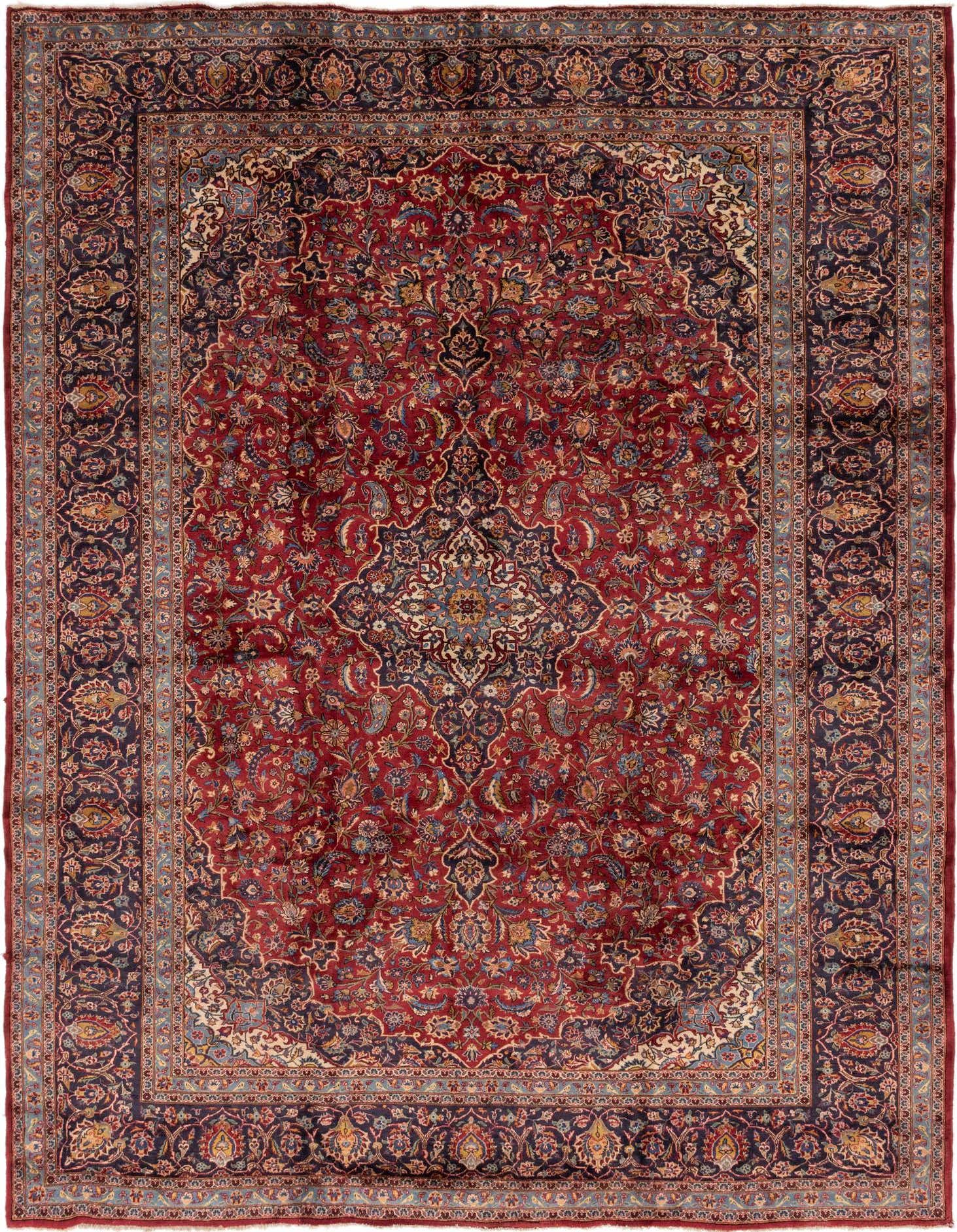 A 10x13 rectangular red Persian Mashad rug with an intricate floral medallion pattern and dark blue border.