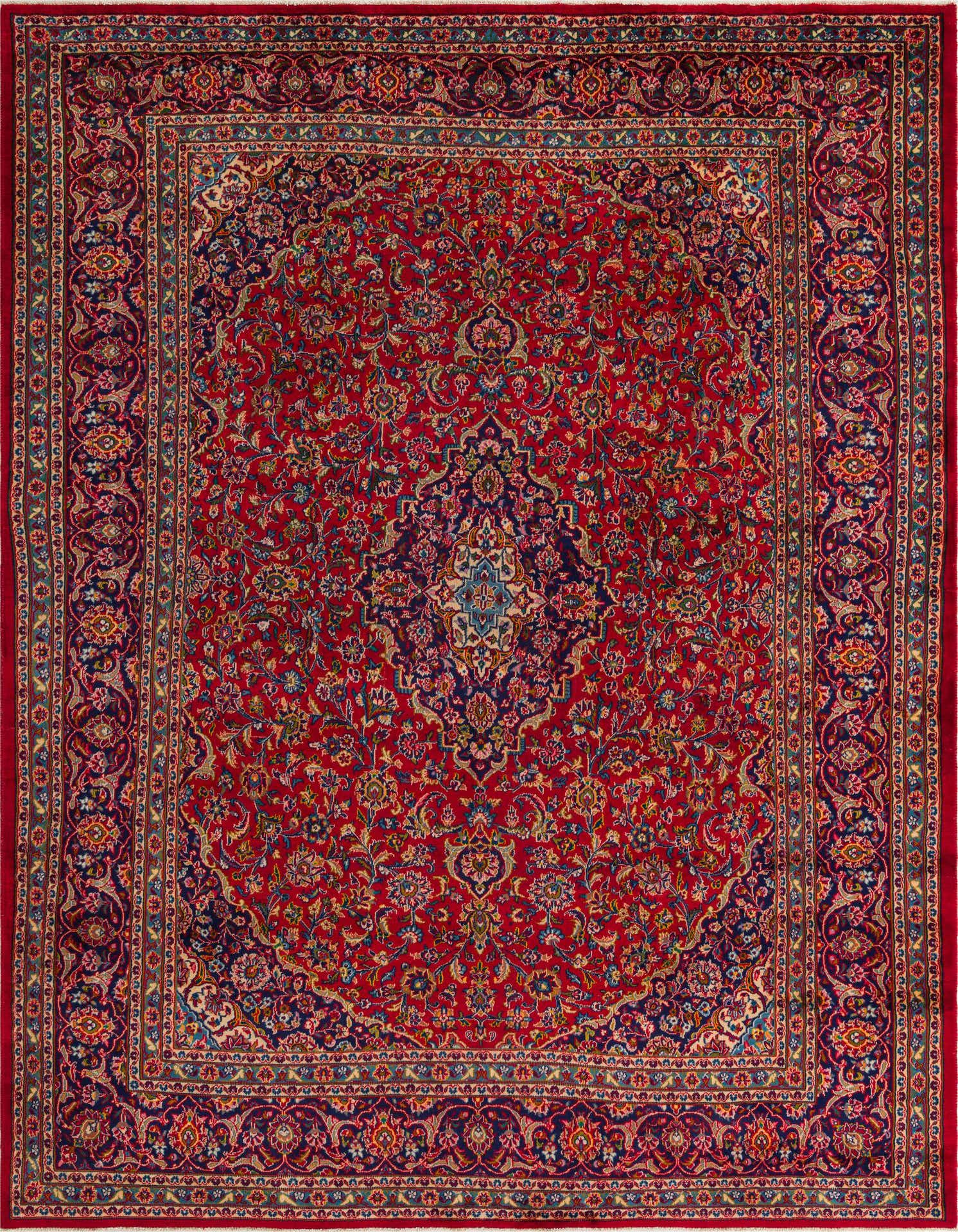 A large 10x13 rectangular red Persian rug with an intricate floral medallion pattern and a dark blue border, suitable for a living room.