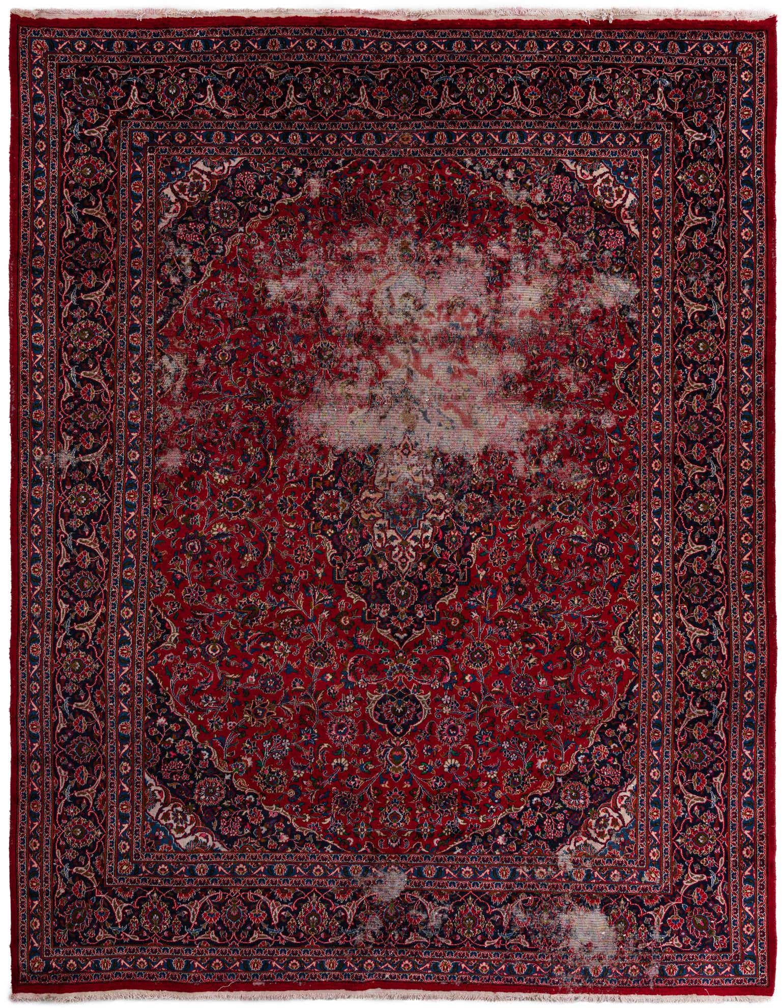 A large 10x13 rectangular red Persian rug with a traditional medallion pattern and intricate floral details, showing a distressed, antique finish.