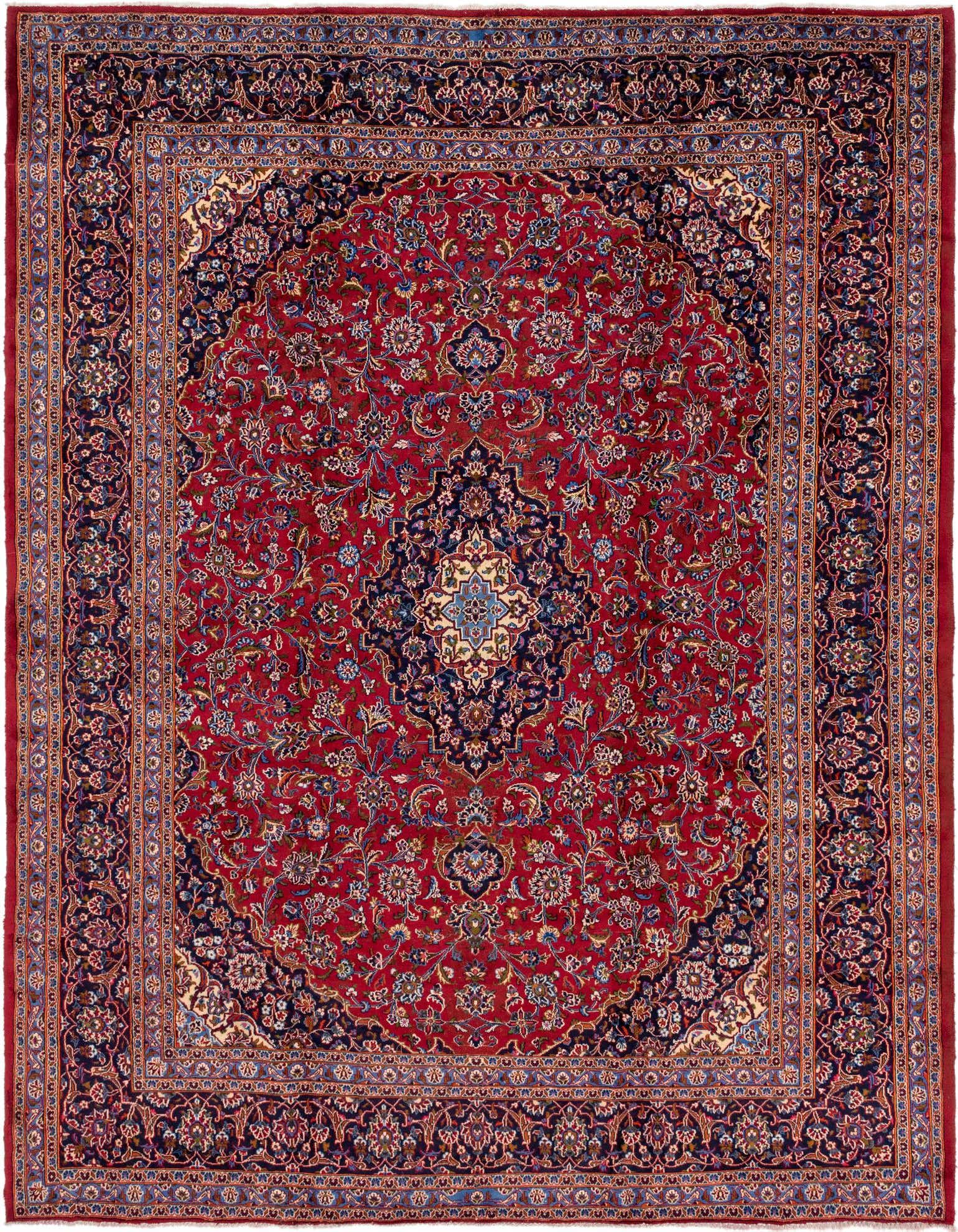 A 10x13 rectangular red Persian rug with a central medallion and intricate botanical patterns in navy, gold, and light blue.