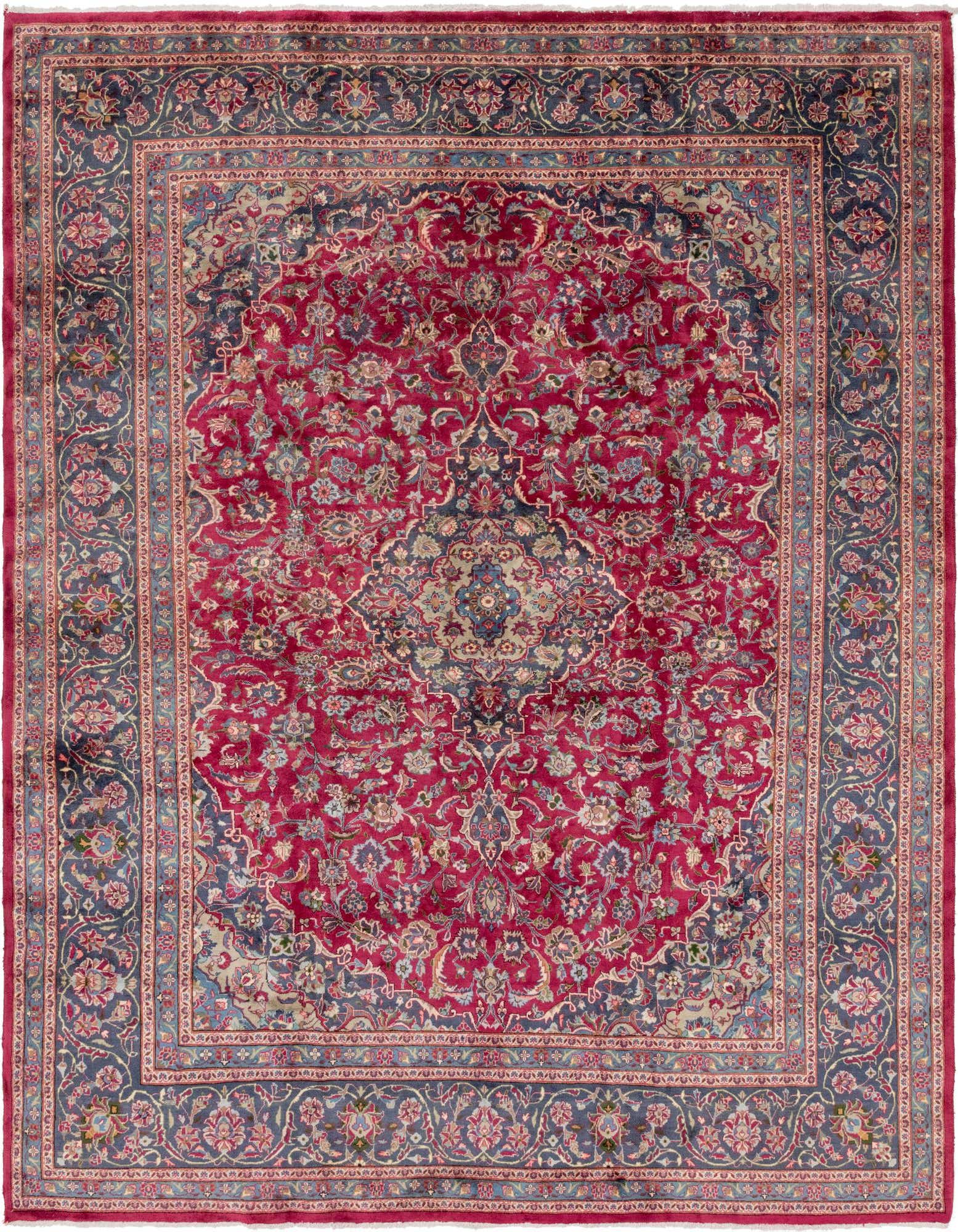 A large 10x13 rectangular red Persian rug with an intricate medallion pattern and a dark blue floral border.