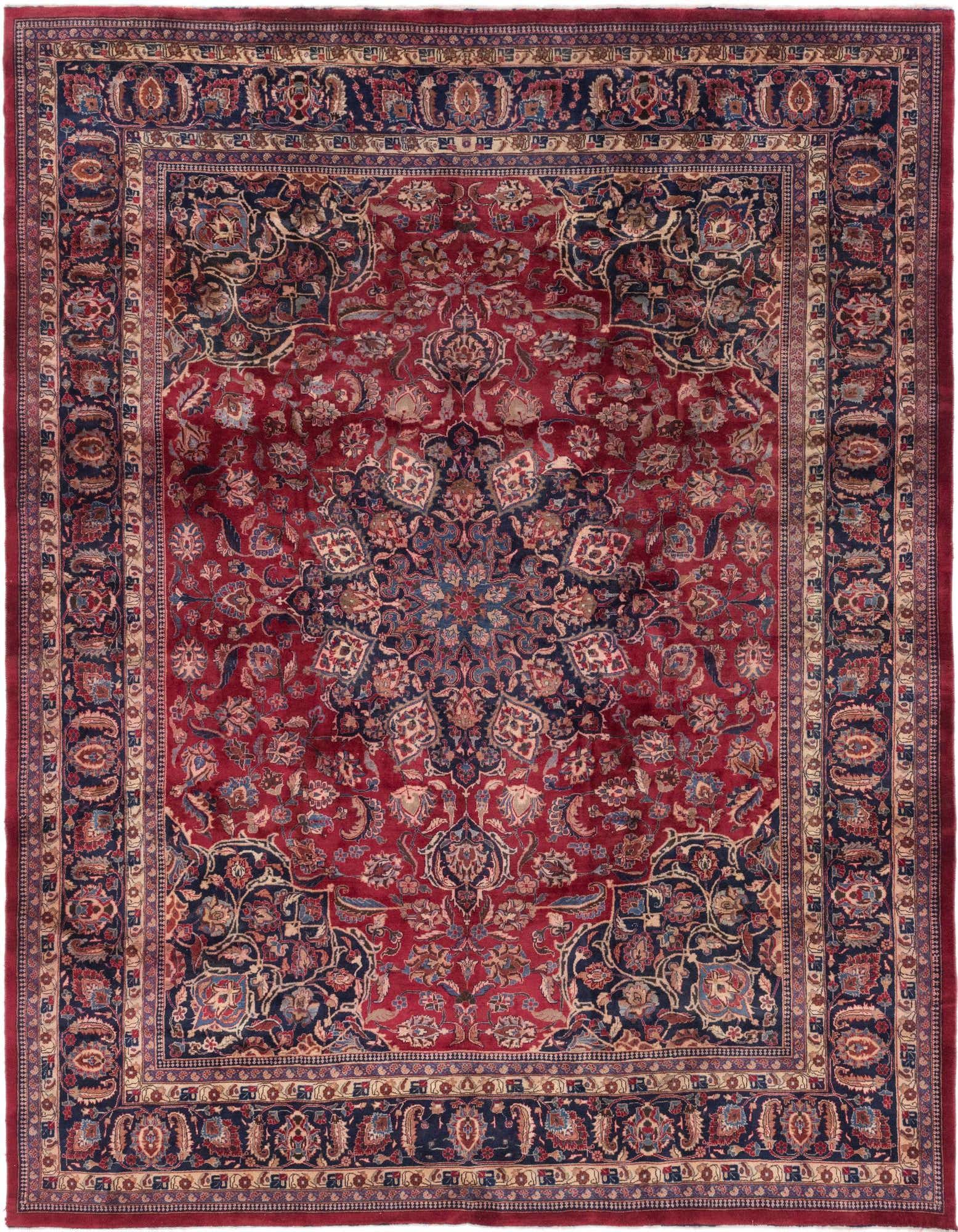 A large 10x13 rectangular red Persian rug with a central medallion and intricate botanical patterns in navy and cream.