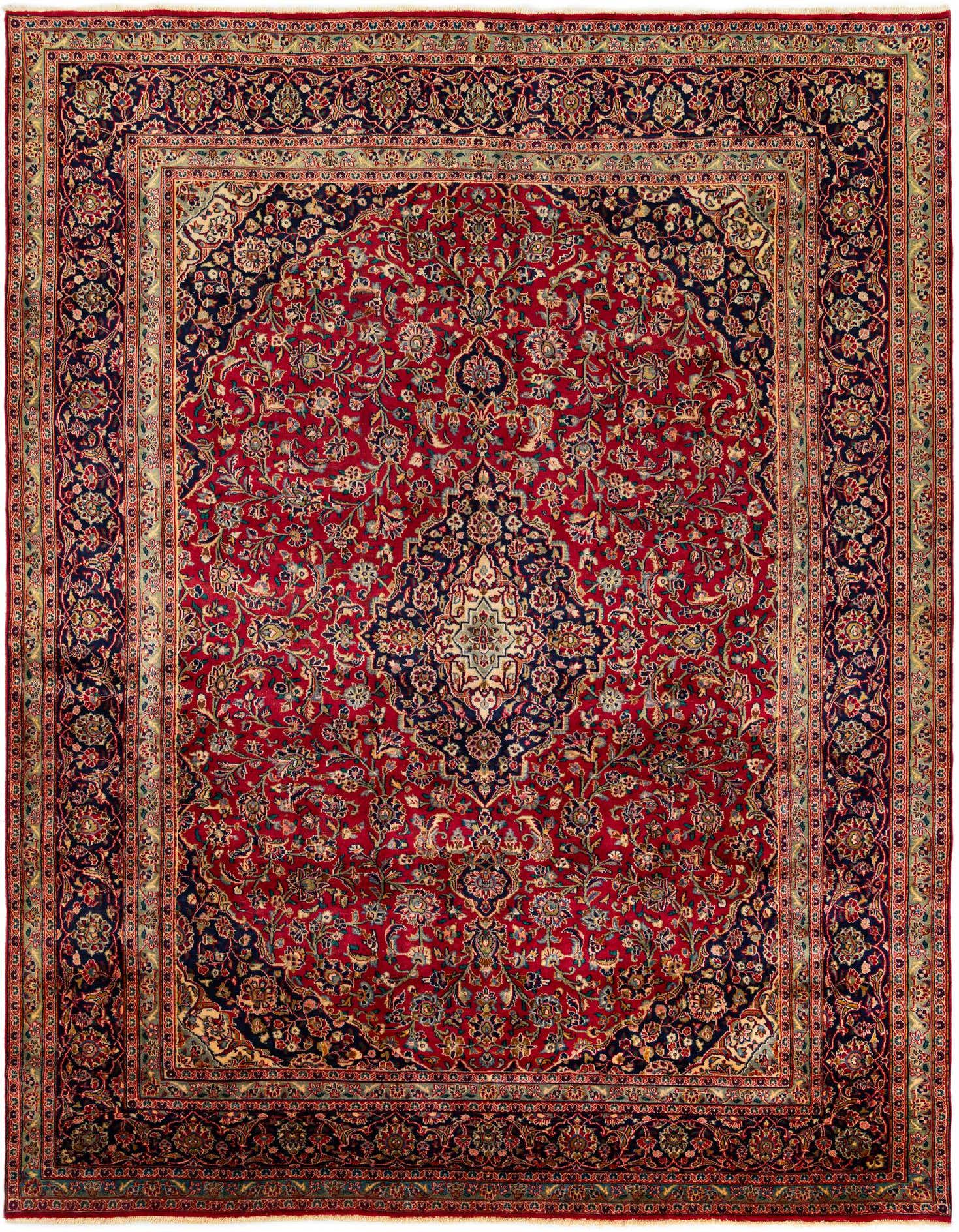 A large 10x13 rectangular red Persian rug with an intricate navy blue and gold medallion pattern, ideal for a living room.