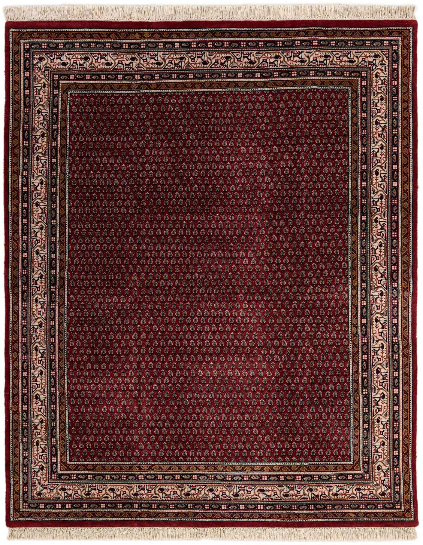 A 5x8 rectangular red traditional Oriental rug with a detailed border and fringe, suitable for a living room.
