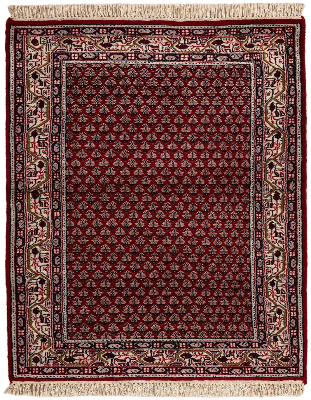 A 3x5 rectangular Mir rug featuring a rich red field with a repeating floral pattern, bordered by an intricate traditional Oriental design in cream, green, and pink, with white fringe.