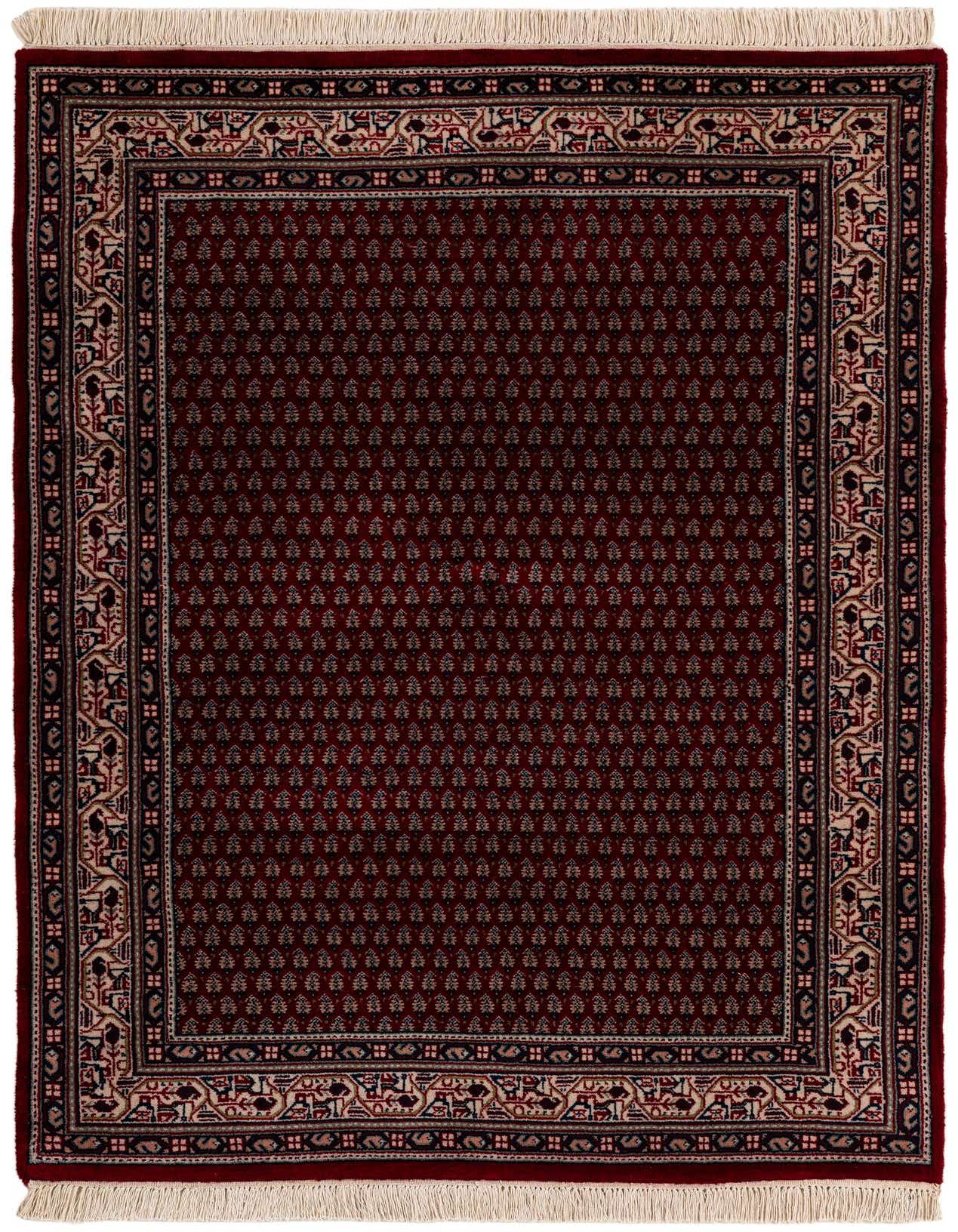 A 4x6 rectangular red traditional wool area rug with intricate floral patterns and decorative borders, featuring white fringes.