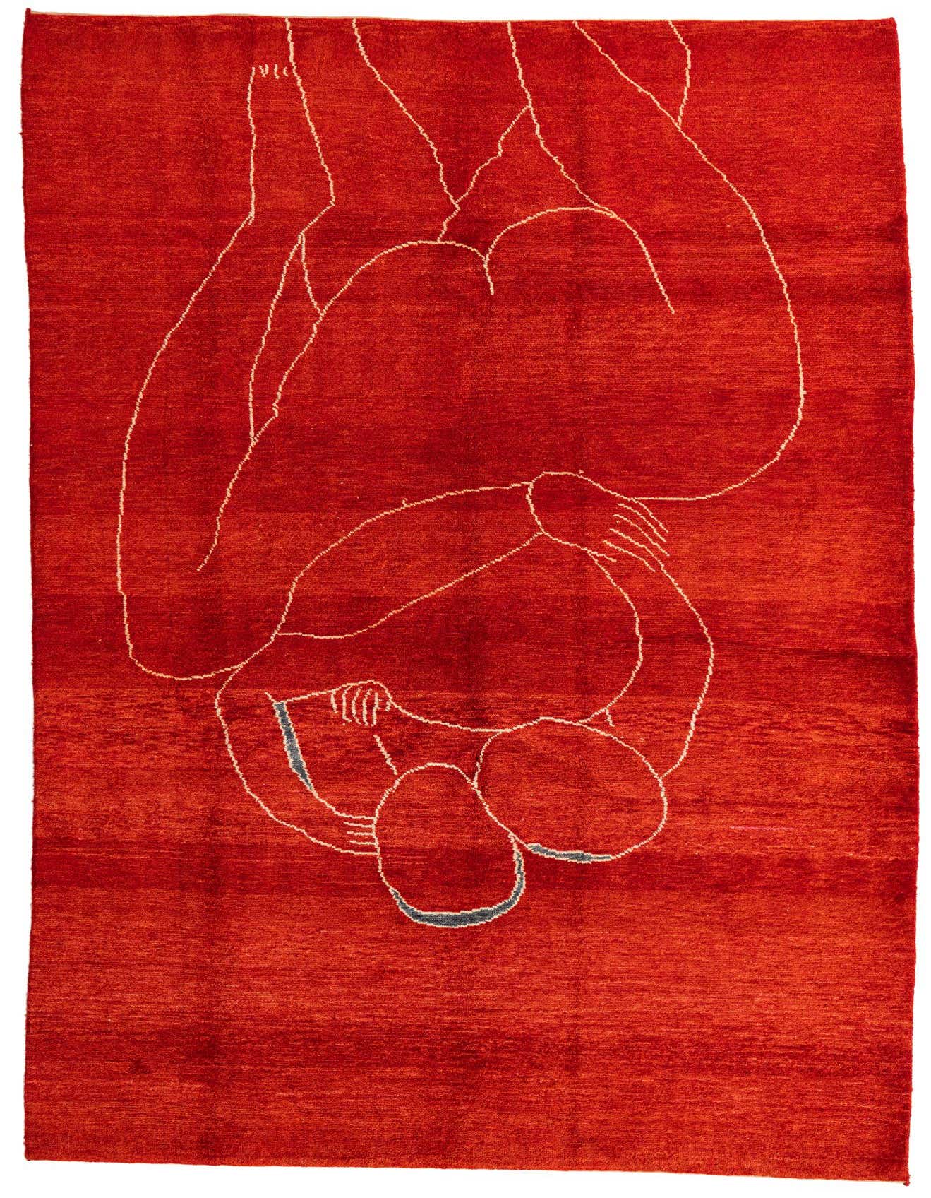 7x10 rectangular red shag rug with an abstract tribal design depicting intertwined figures in cream and blue.