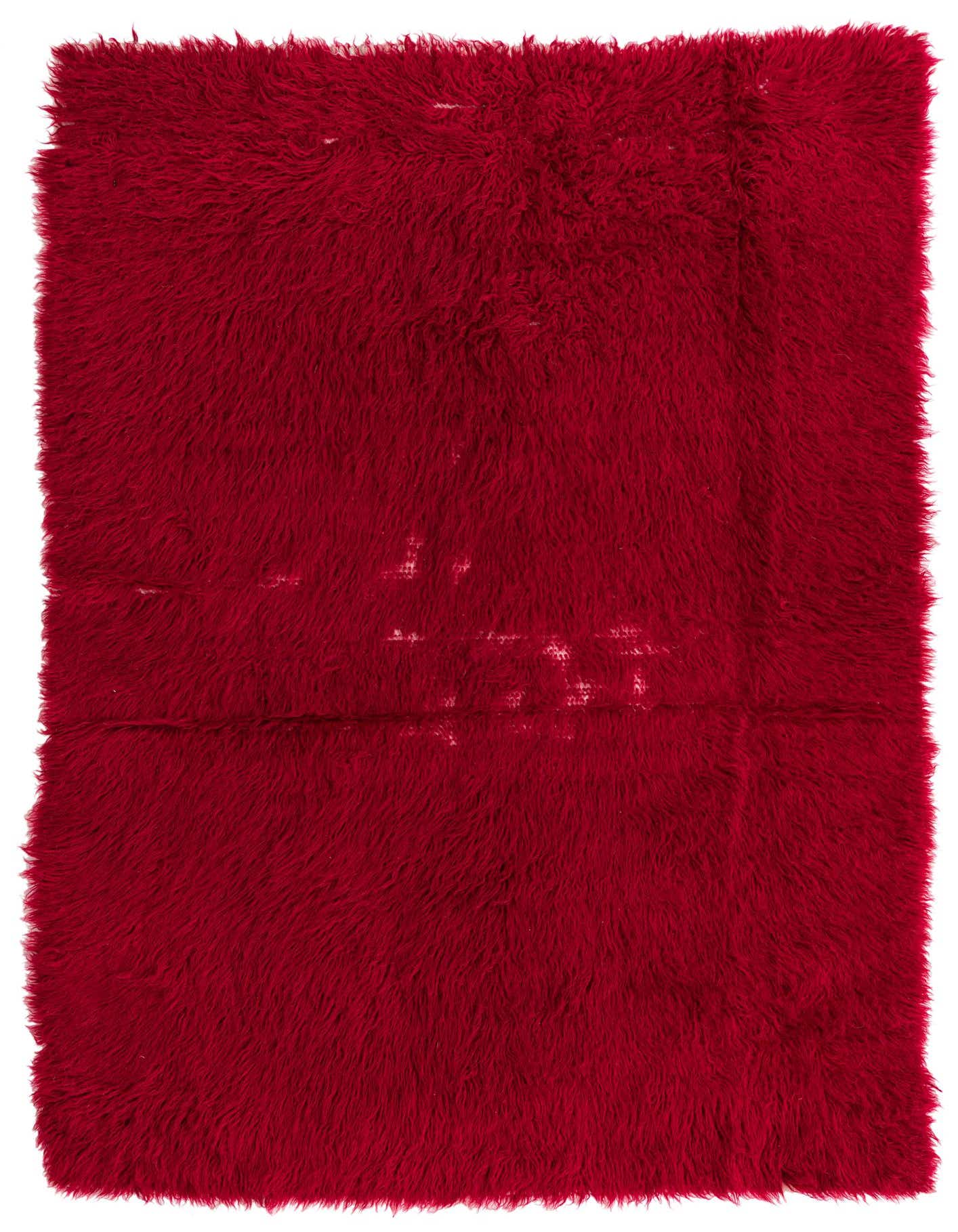 A plush 4x6 rectangular red shag rug with a subtle tribal pattern, perfect for a cozy living room.