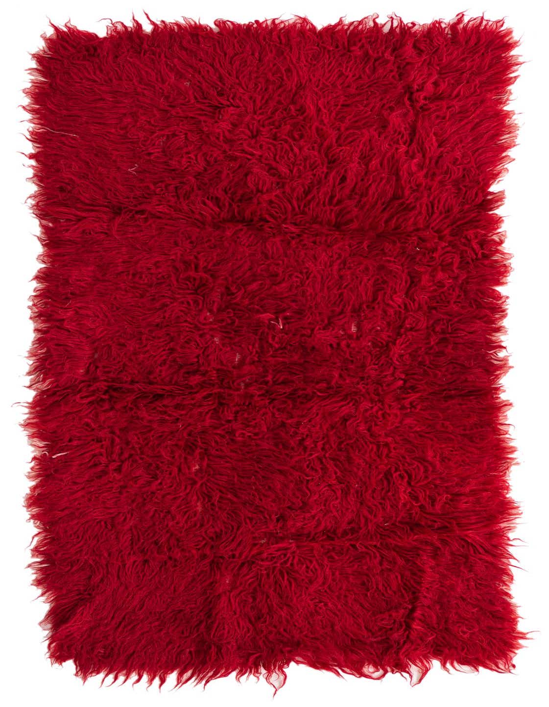 A vibrant 3x5 rectangular red shag rug with a thick, plush pile, showcasing its handmade texture.