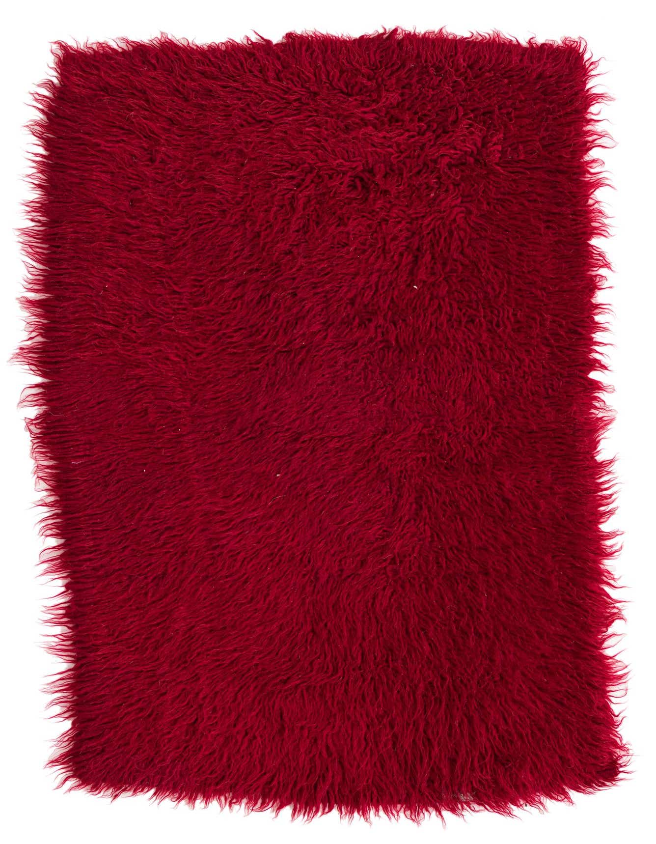 A rectangular 3x4 red shag rug with a thick, plush pile and a slightly irregular, handmade edge.