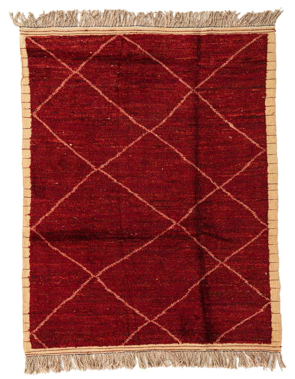 A 5x8 rectangular red wool shag rug with a cream diamond tribal pattern and fringed edges.