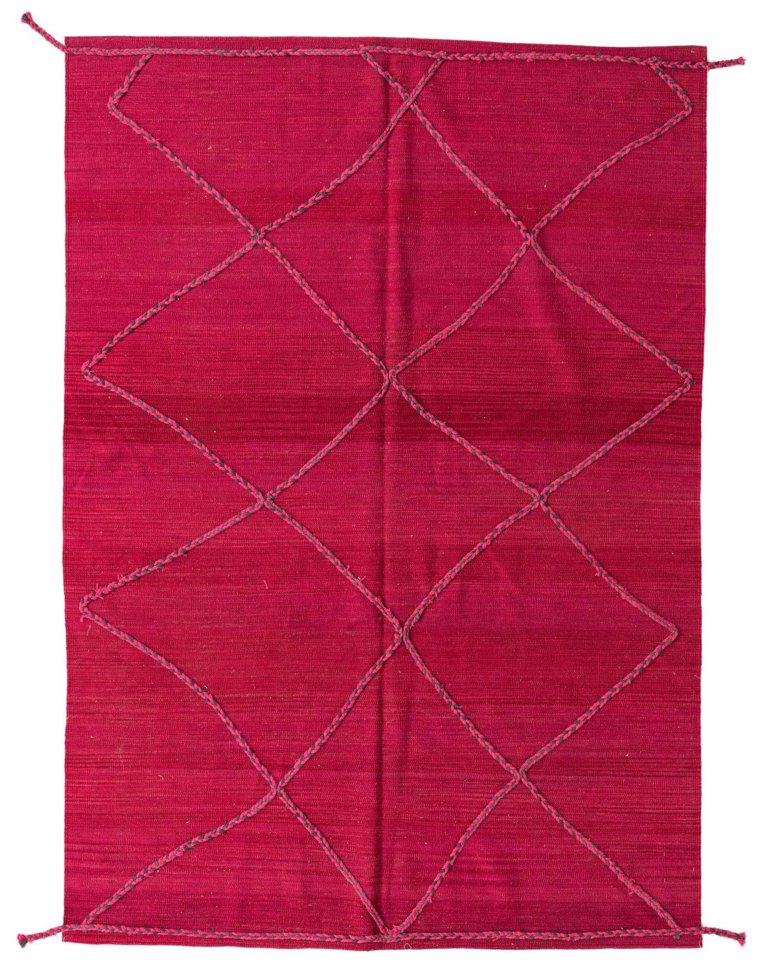 A 5x8 rectangular red wool shag rug with a braided diamond tribal pattern, ideal for a living room.