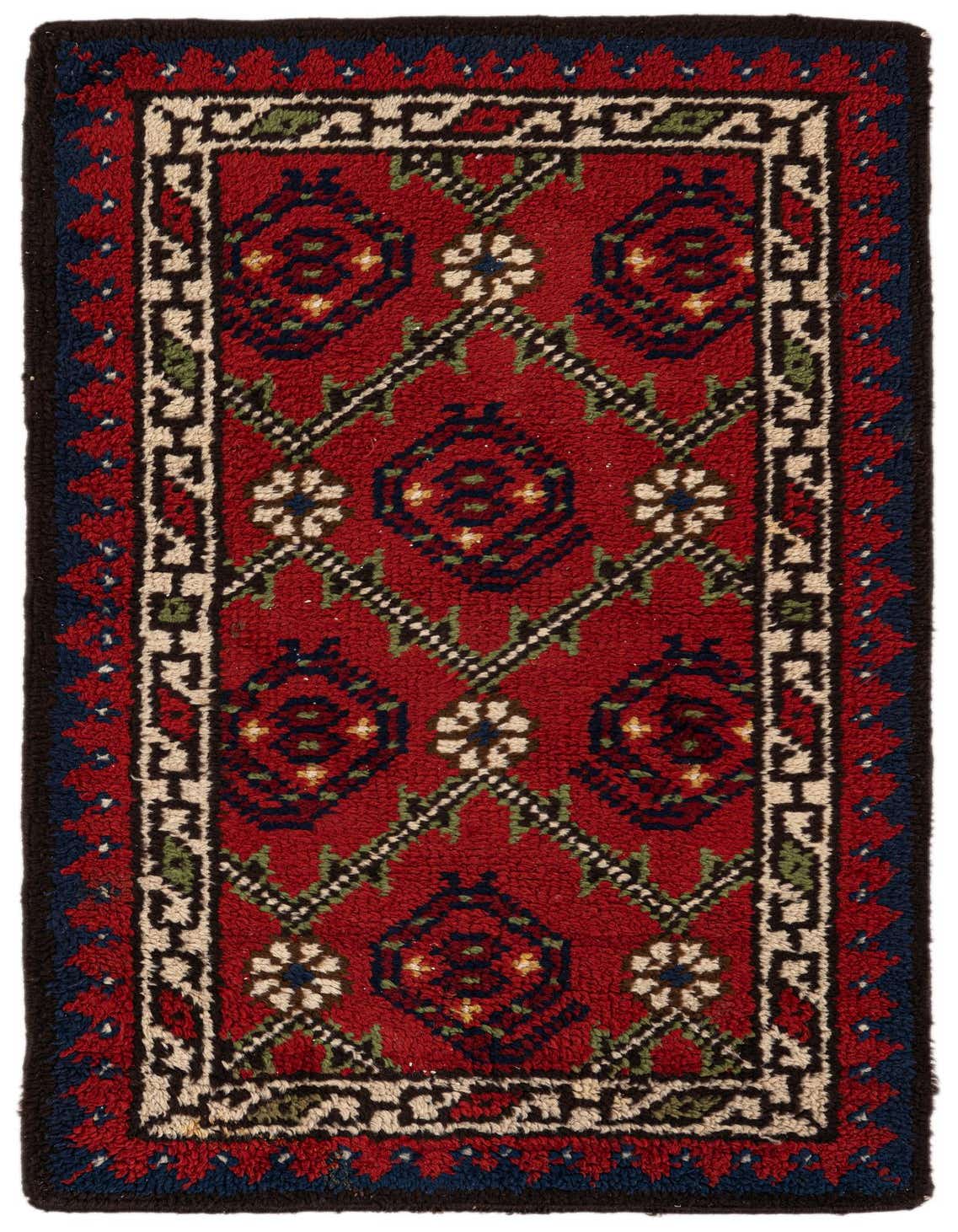 A 3x4 rectangular red wool shag rug with a traditional tribal pattern featuring navy, cream, and green accents.