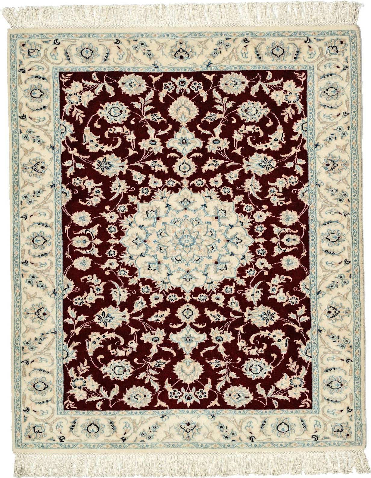 A 3x5 rectangular handmade indoor rug featuring a rich red field with intricate floral patterns in cream and light blue, bordered by a cream frame with complementary floral motifs and fringe.