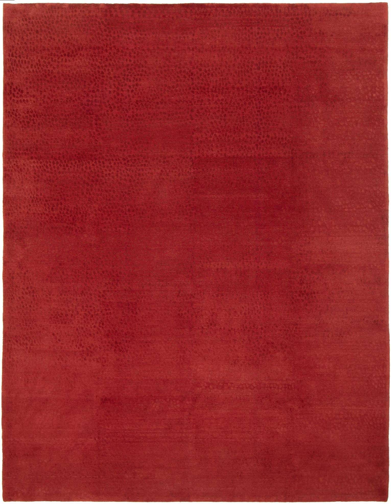 A 9x12 rectangular Odegard Persian rug in rich red wool and silk, featuring a subtle textured pattern.