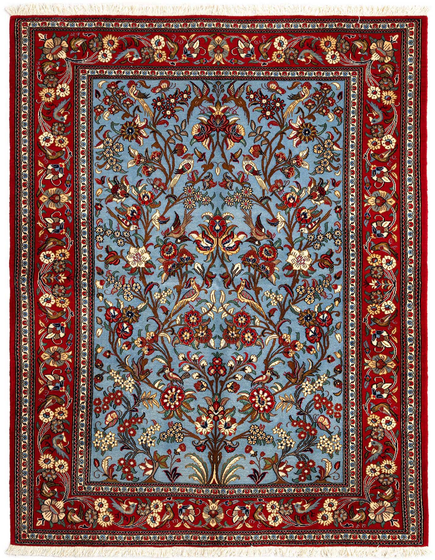 A rectangular 5x7 red and blue Persian rug with an intricate floral and bird pattern, featuring a central light blue field and a wide red border.