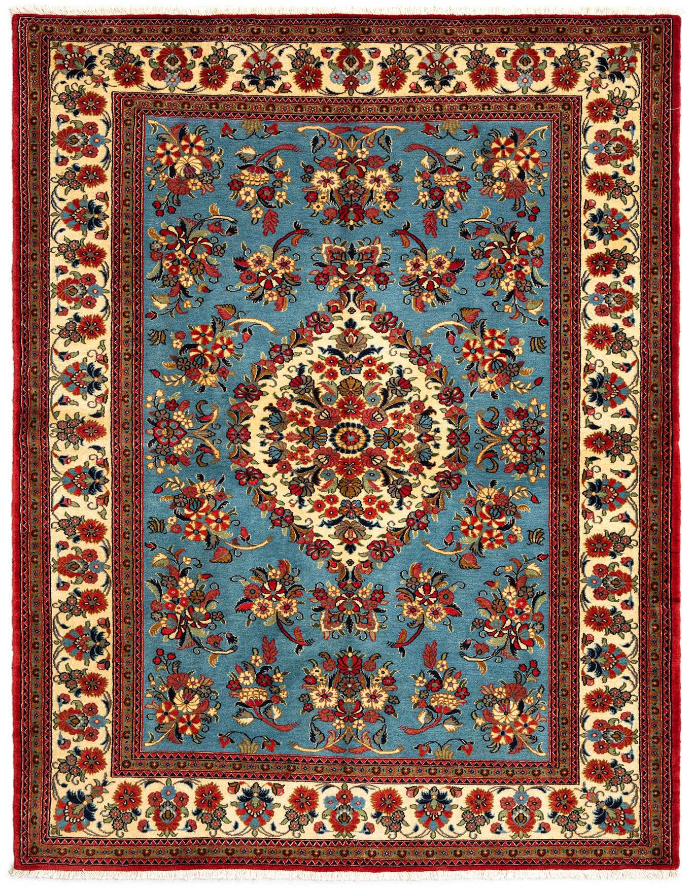 A rectangular 5x7 Persian rug with a vibrant red border, a cream inner border with floral motifs, and a light blue field featuring a large central medallion and scattered floral designs in red, blue, and cream.