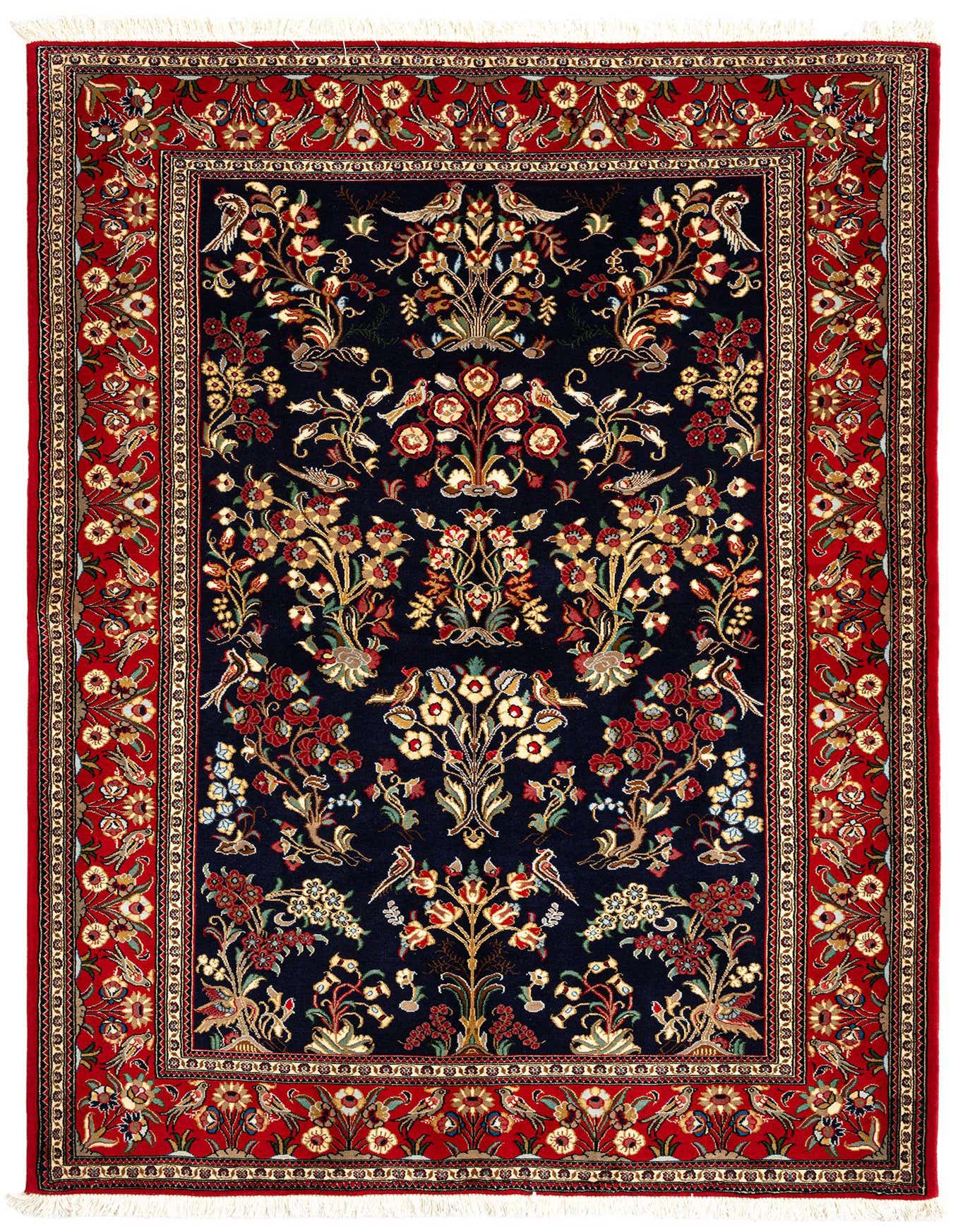 A 5x7 rectangular Persian rug with a deep red border and a navy blue center, featuring intricate floral and bird patterns.