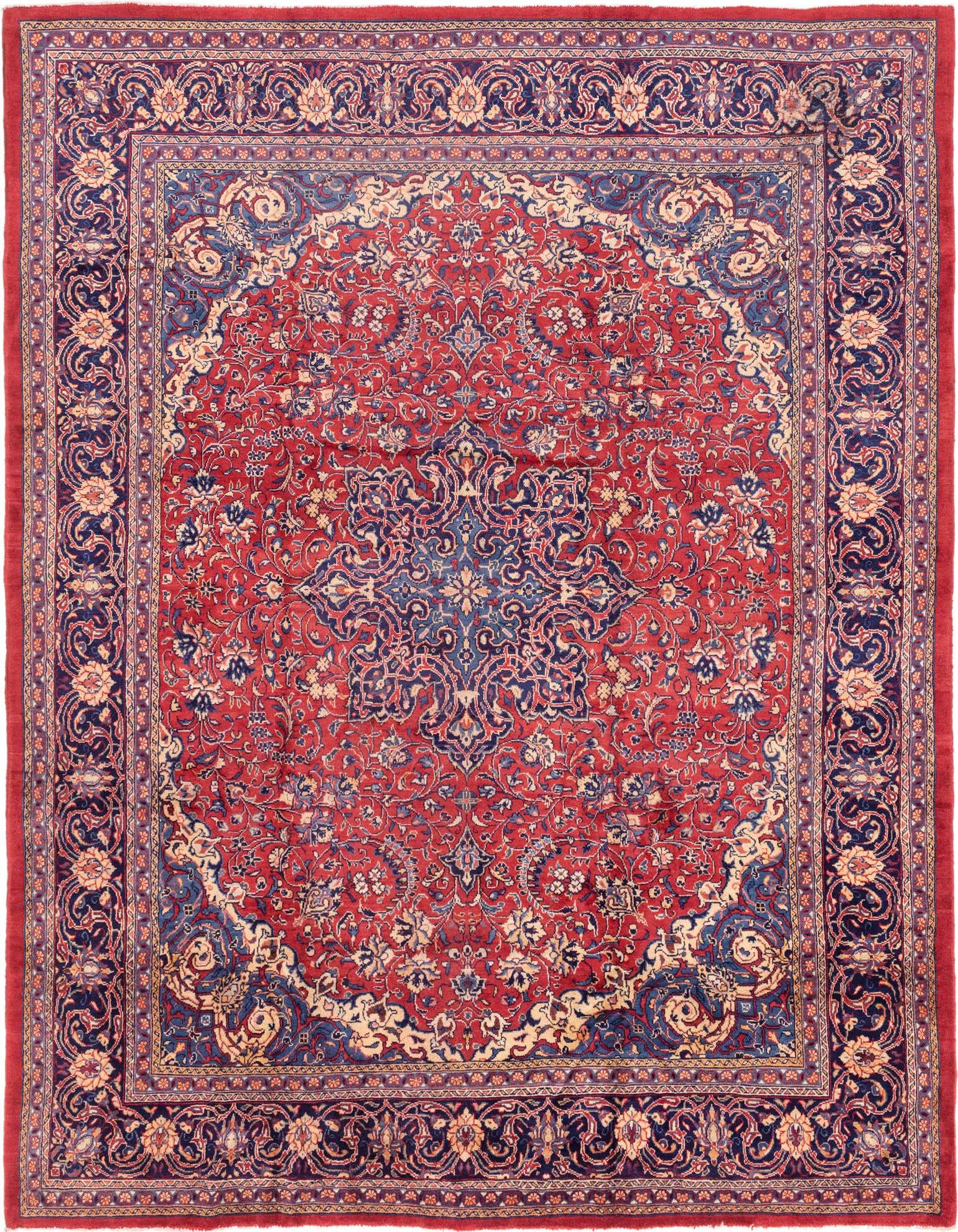 A 10x13 rectangular red Persian wool rug with an intricate blue and cream botanical medallion pattern.