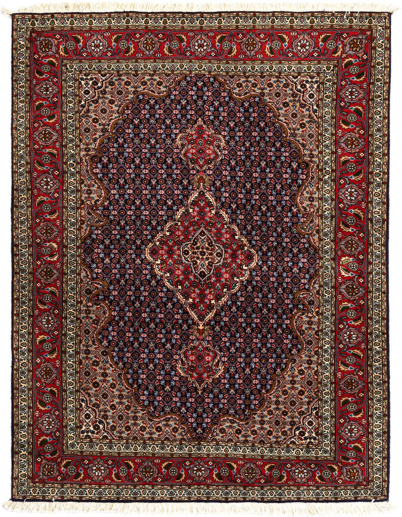 A rectangular 3x5 Persian rug featuring a deep red border and a navy blue field with intricate floral patterns, handmade from wool and silk.