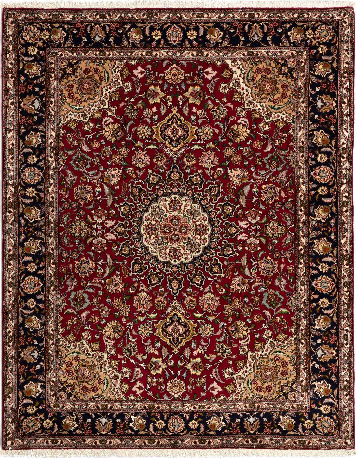 A 4x6 rectangular red Persian rug with intricate floral patterns and a dark blue border, handmade from wool and silk.