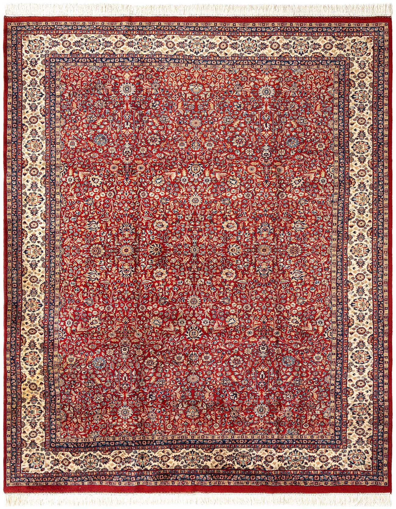 A rectangular 8x11 red Persian wool rug featuring an intricate floral pattern and a cream and navy border.