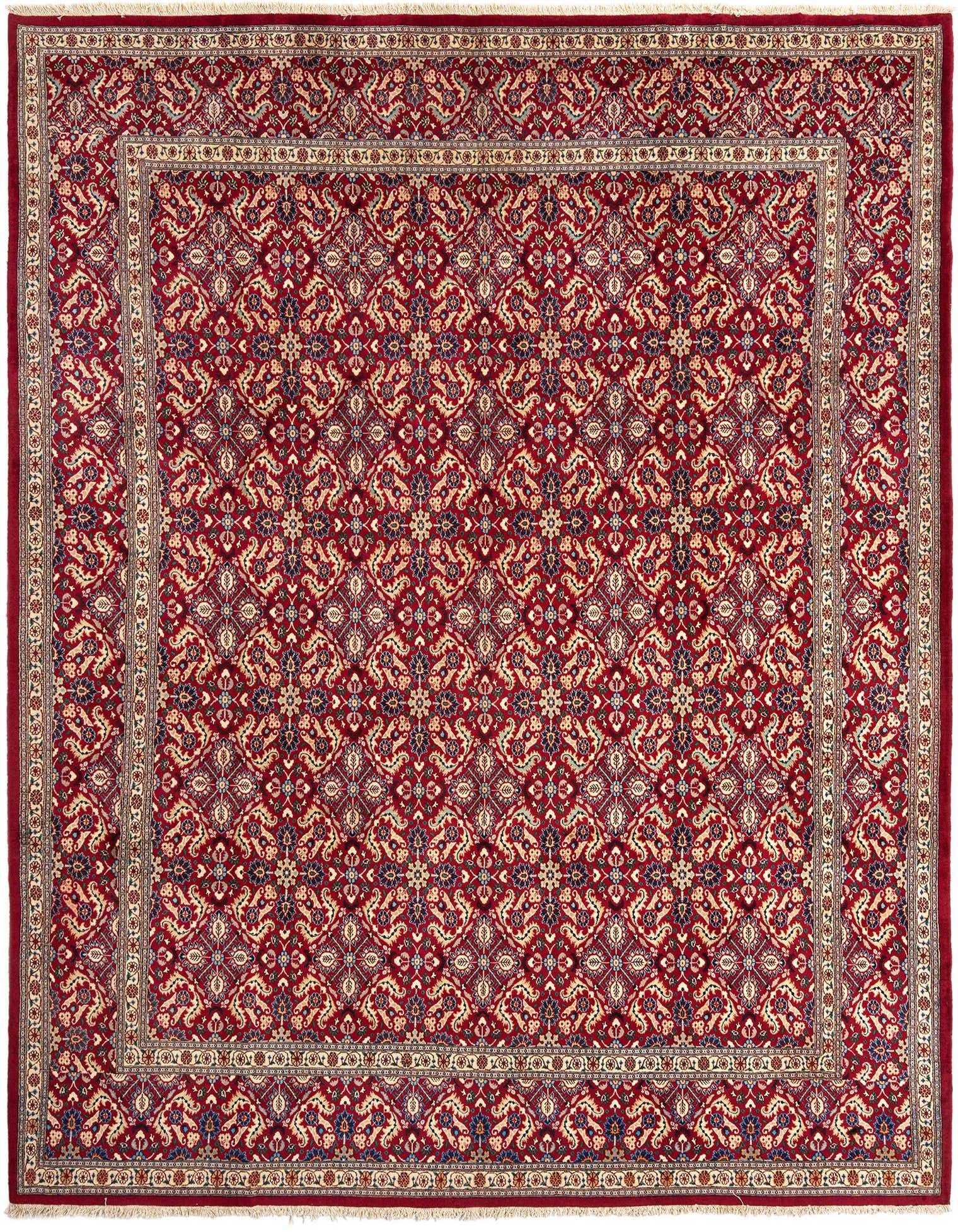 A 9x12 rectangular Tabriz Persian rug in rich reds, featuring intricate floral and medallion patterns with a detailed border, ideal for a living room.
