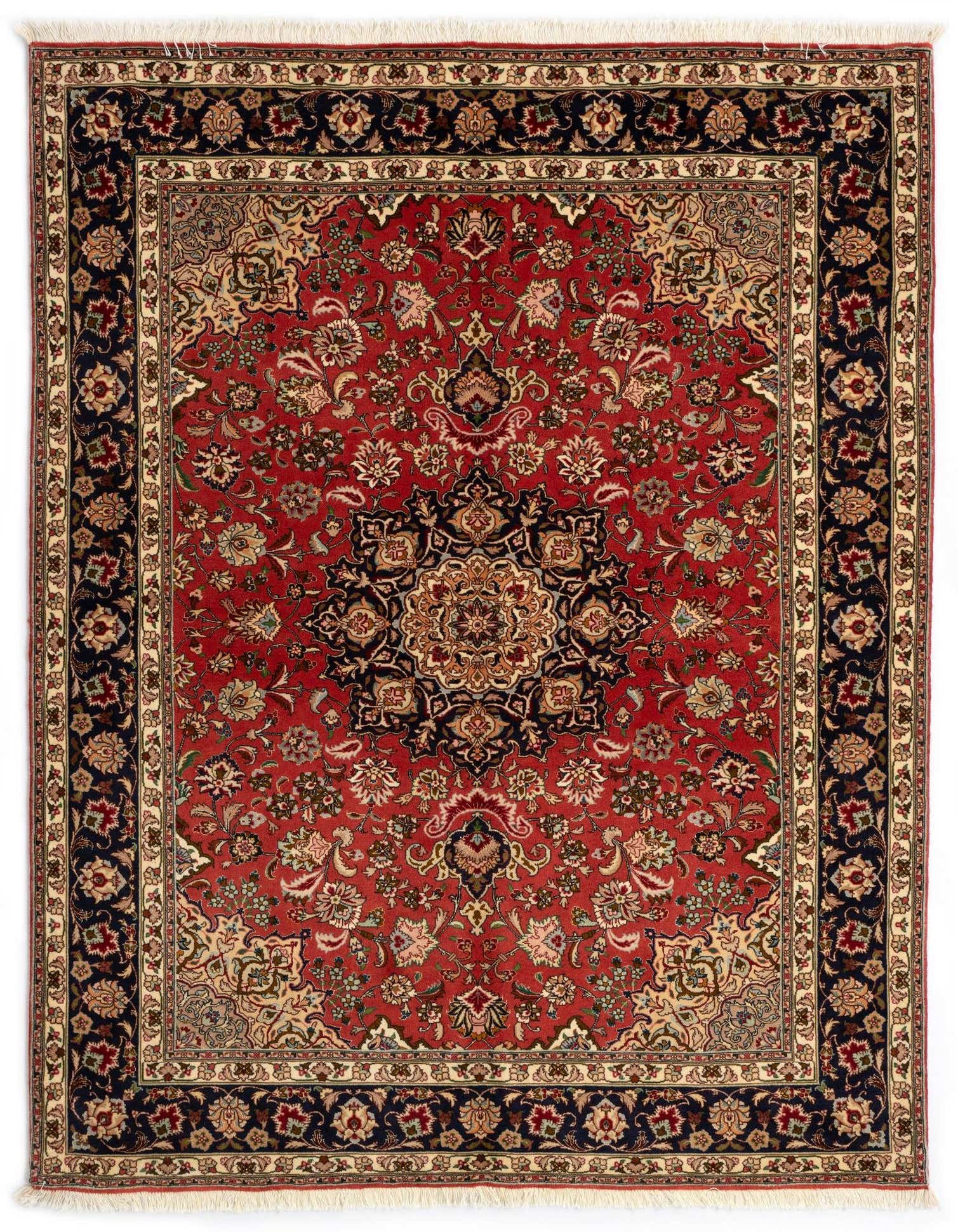 A 4x6 rectangular red Persian rug with a detailed floral medallion pattern and a dark blue border.