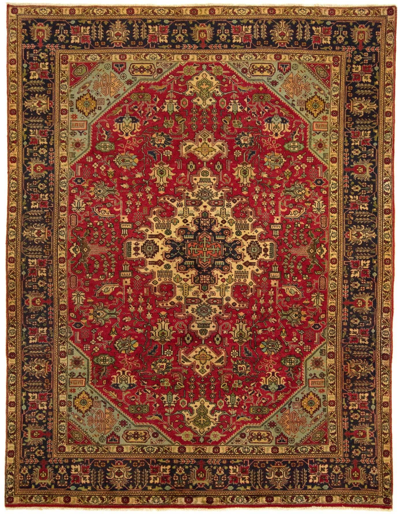 A 7x10 rectangular Tabriz Persian rug featuring a rich red field with intricate floral motifs and a dark blue border.