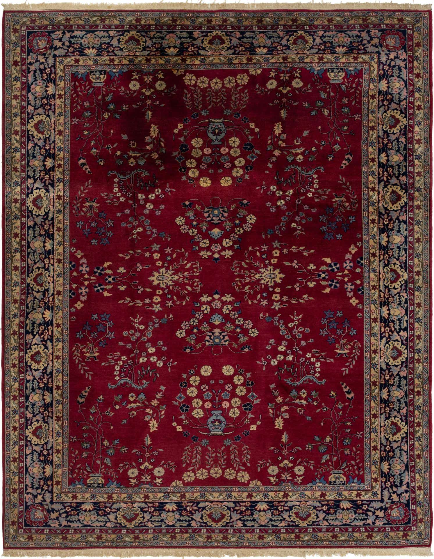 A 9x12 rectangular red Tabriz rug with a detailed floral and botanical pattern and a multi-layered border.