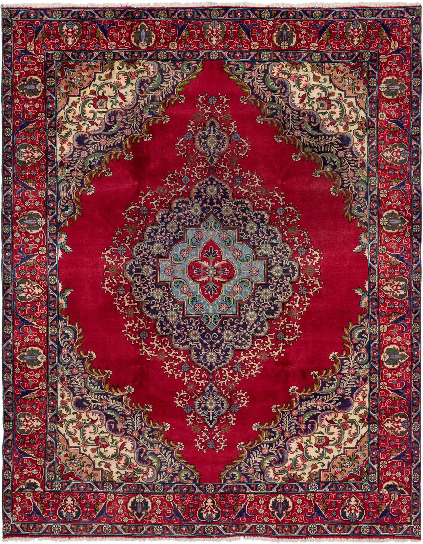 A 10x13 rectangular red Persian Tabriz rug with an ornate central medallion and intricate floral patterns in blues, creams, and greens.