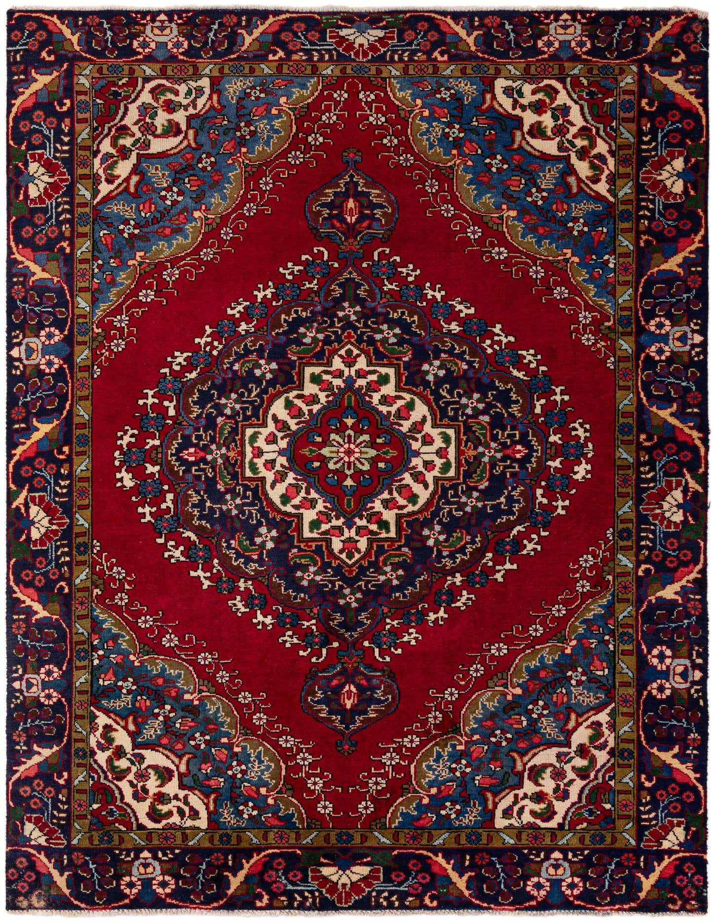 A 6x9 rectangular red Persian Tabriz rug with a detailed navy and cream medallion pattern, ideal for a living room.